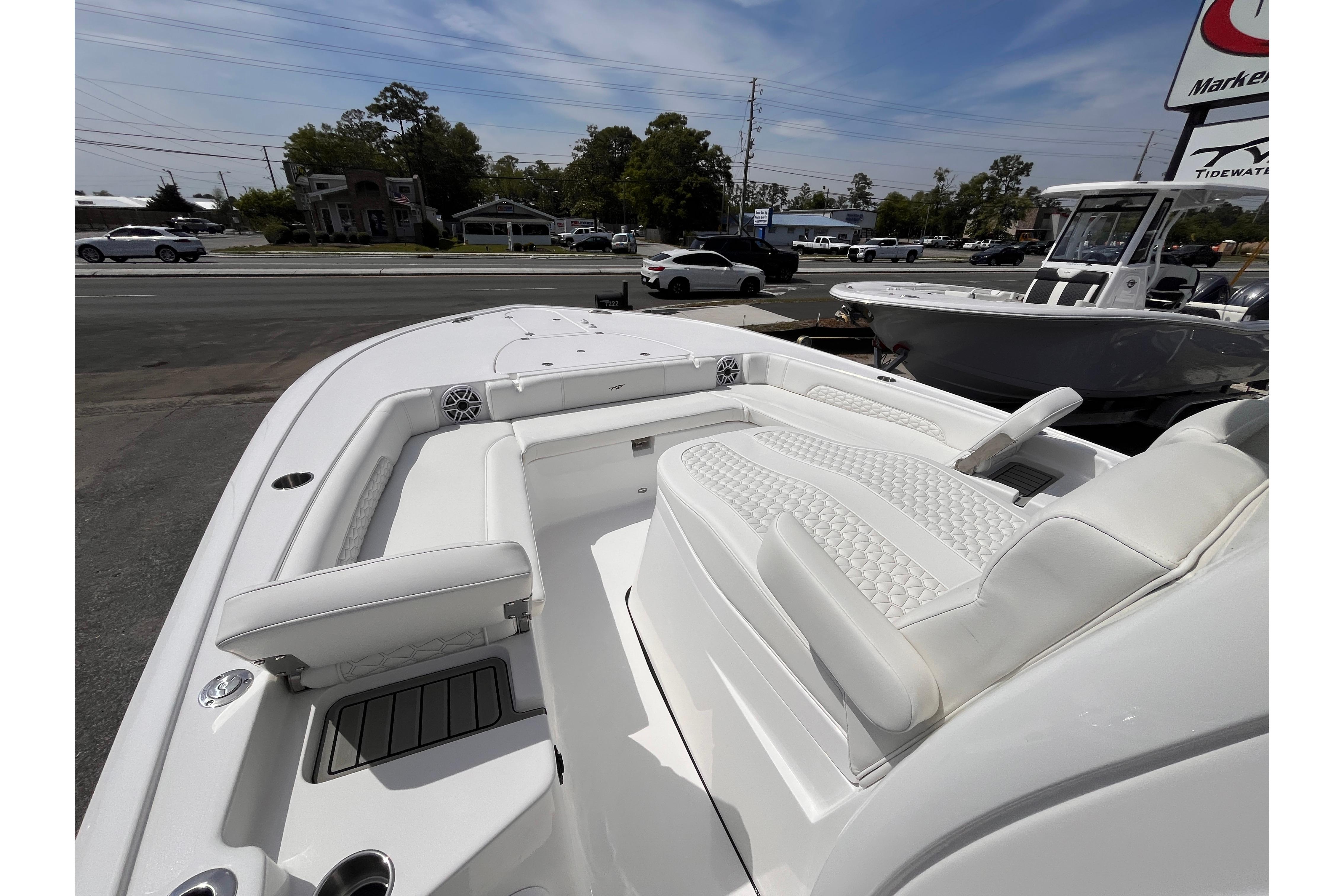 2026 Tidewater 3100 Carolina Bay boat with luxurious white seating and modern design.