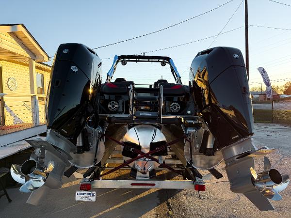 2024 Godfrey XP 27' boat with twin 400HP V10 engines, rear view.