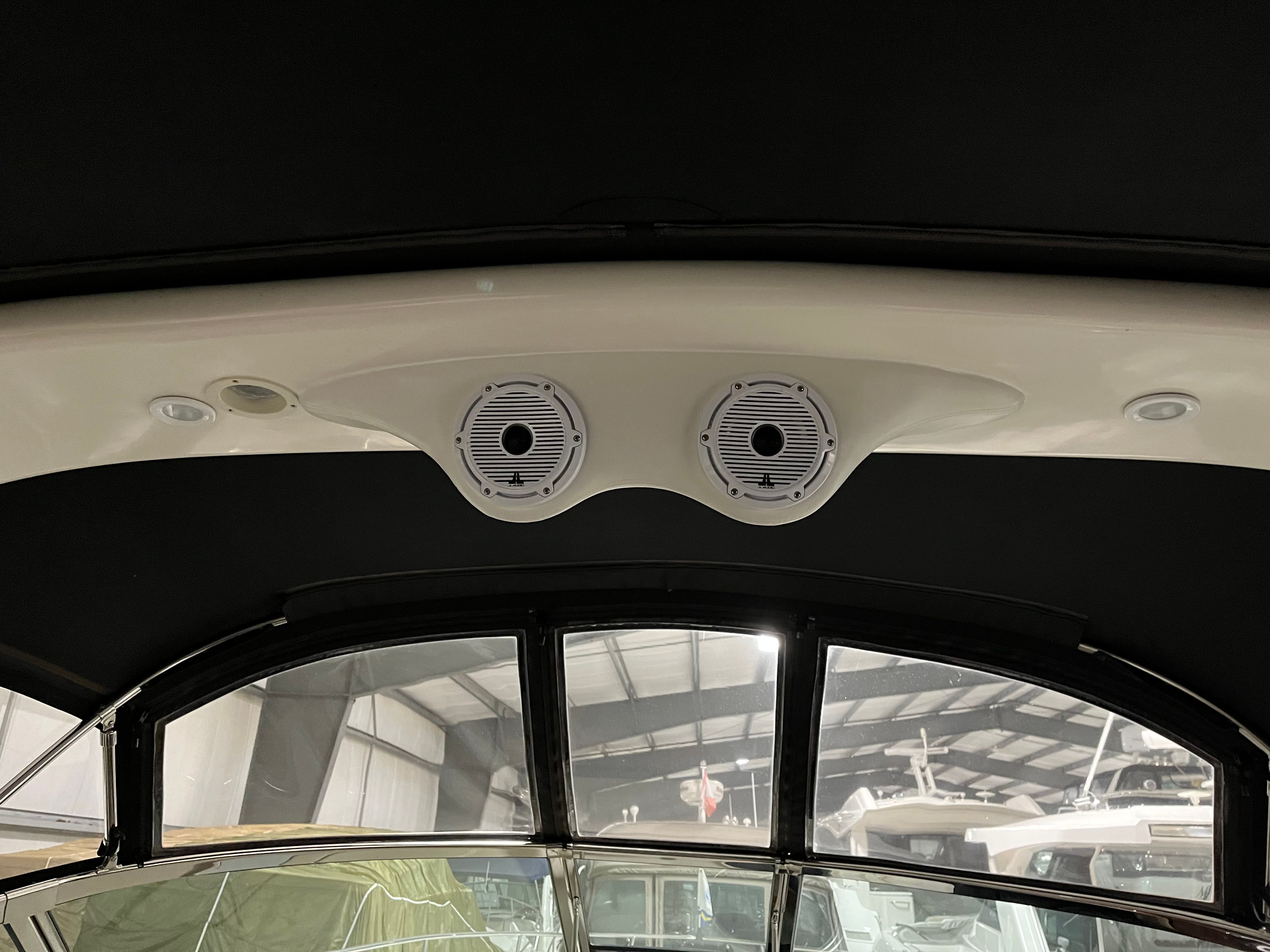 Interior of a 2005 Sea Ray Sundancer with speakers.