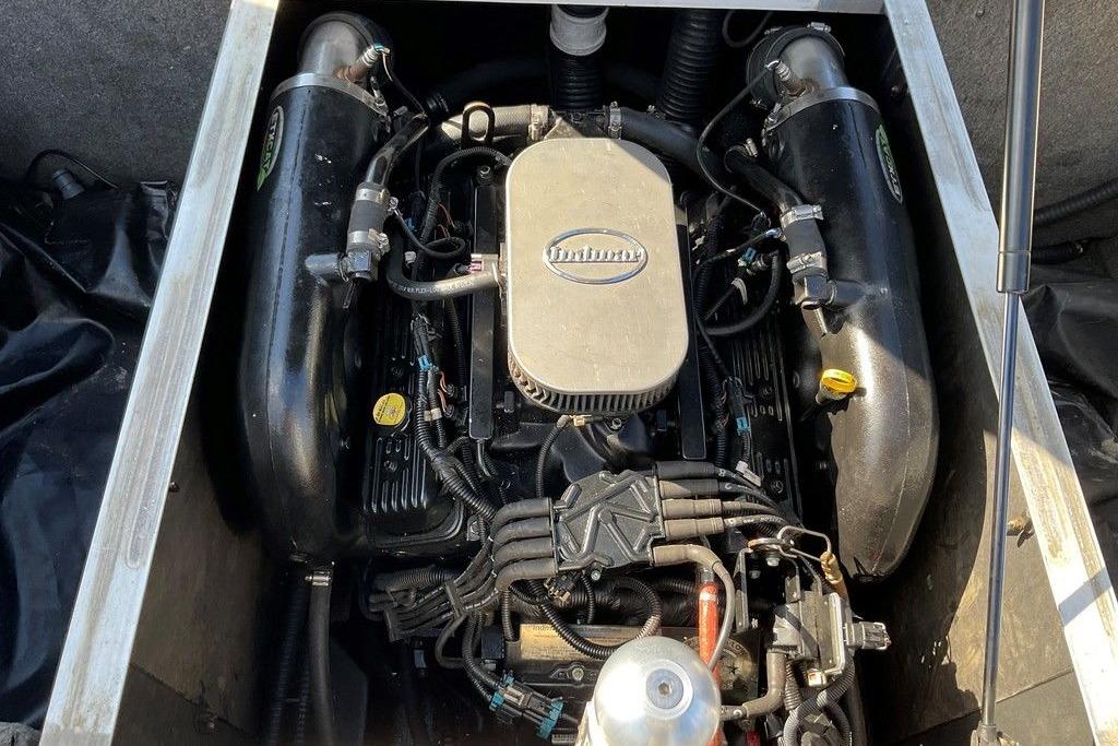 2015 Moomba Outback V engine compartment showcasing detailed components and layout.