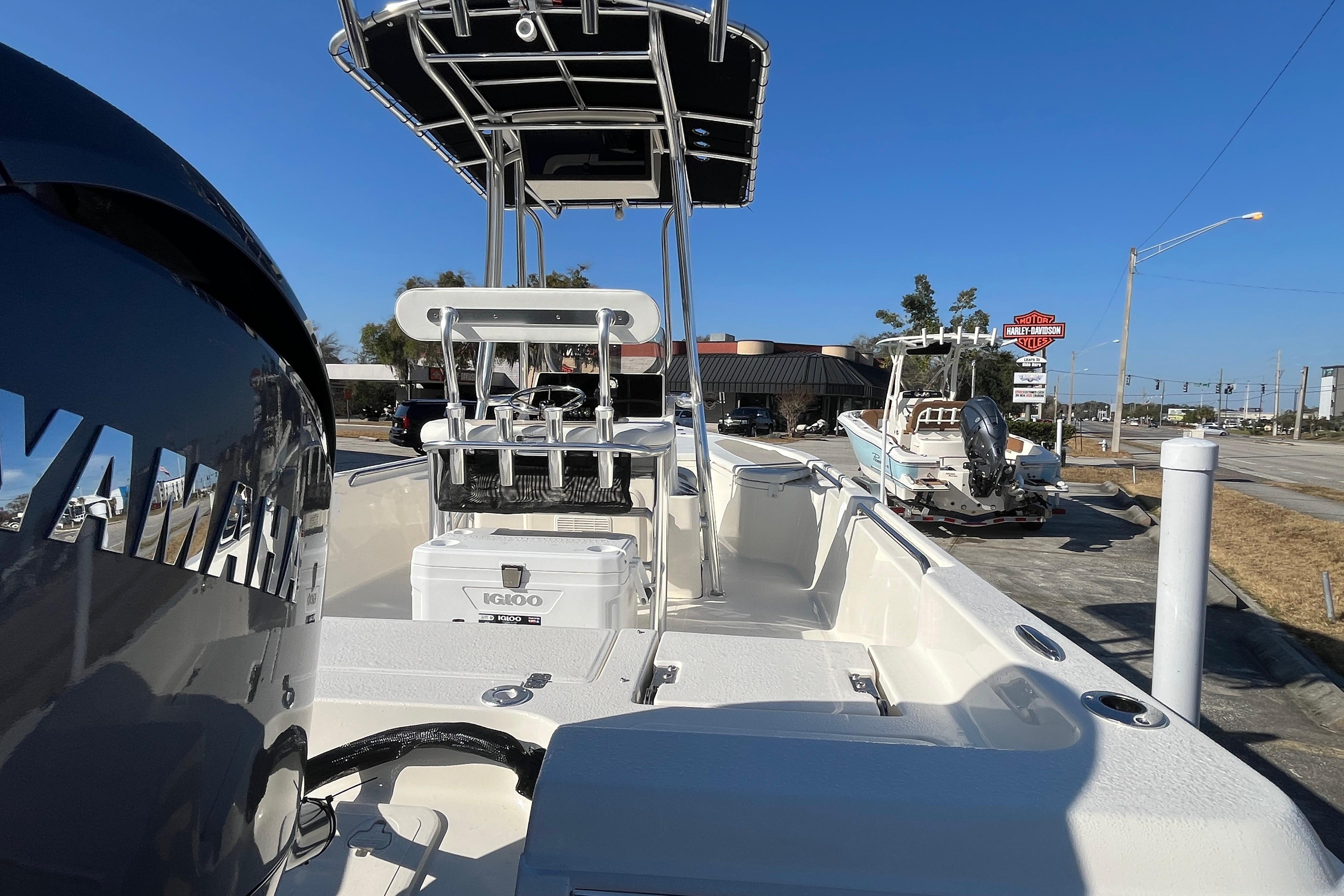 2026 Bulls Bay 2200 boat with Yamaha engine, parked outdoors under clear blue sky.