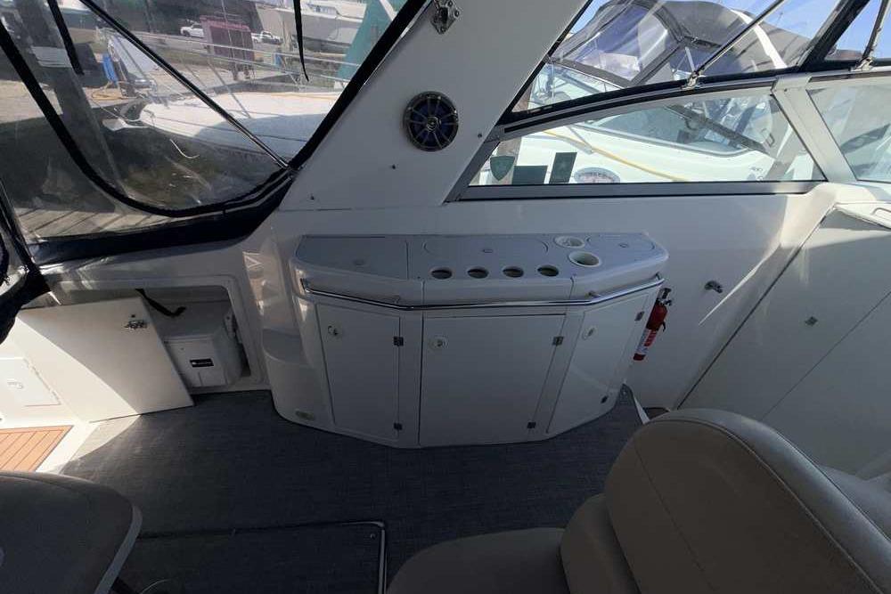 Interior of a 2001 Monterey 282 Cruiser boat with seating and storage compartments.