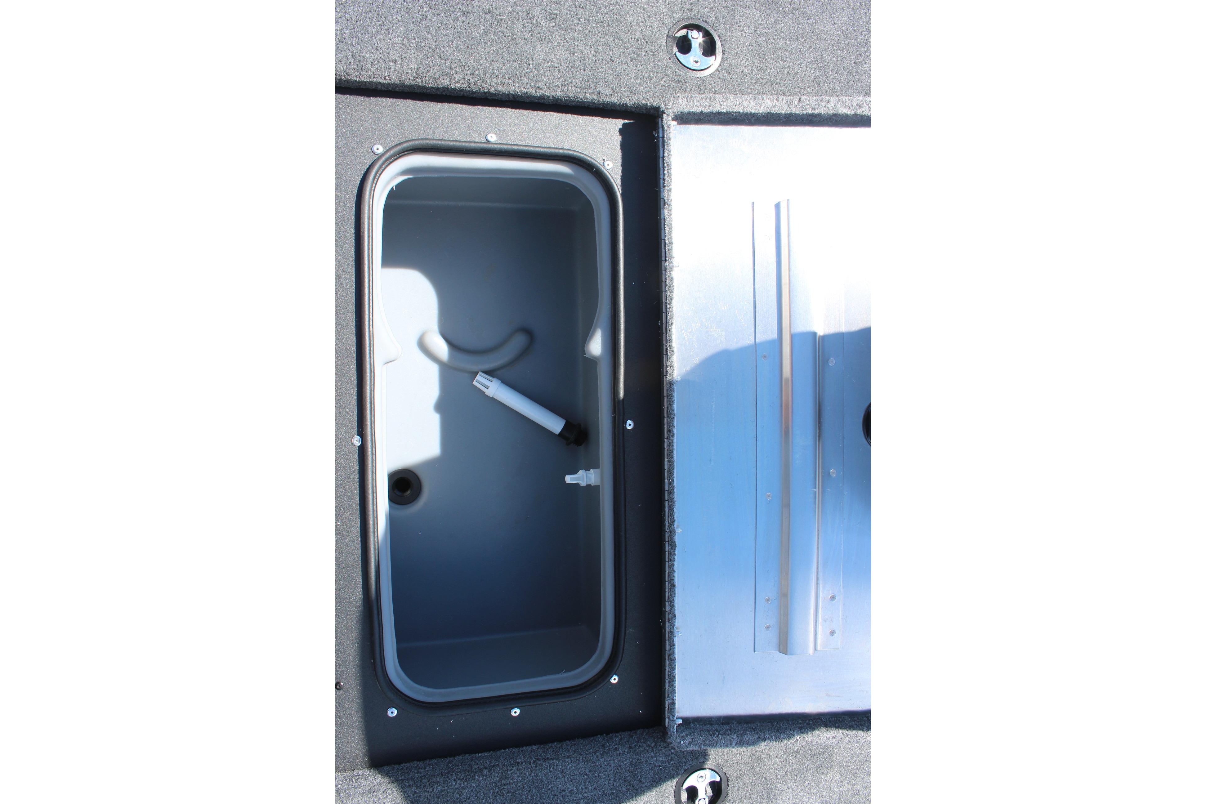 2026 Tracker Pro Team 175 Crappie Edition boat storage compartment, open and empty.