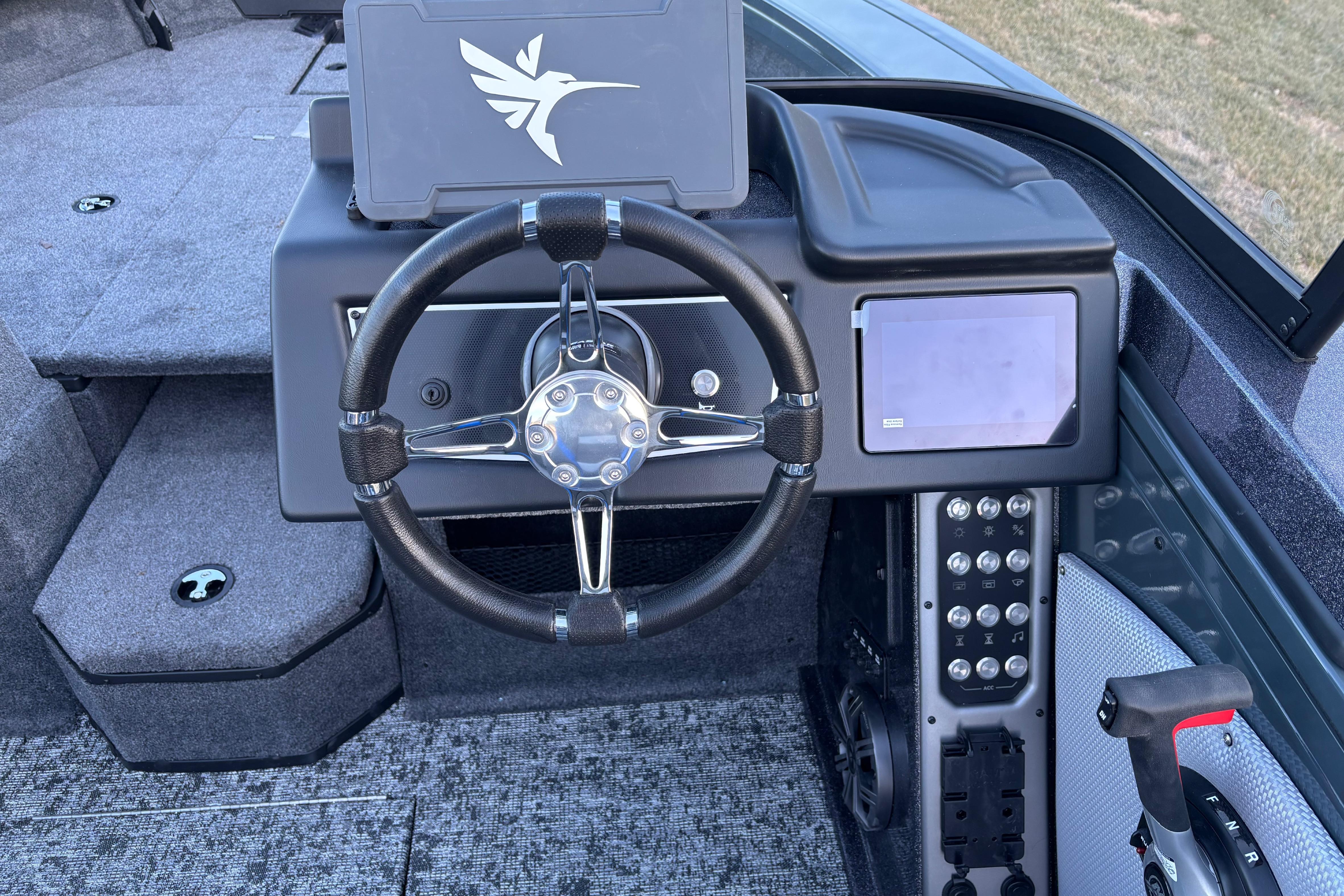 Steering console of 2026 Ranger VX1988 WT boat with modern controls and touchscreen display.