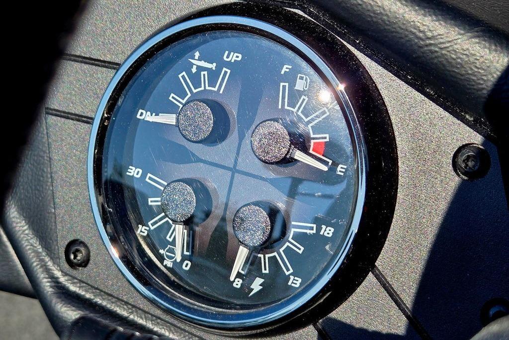 Dashboard gauges of 2026 Skeeter ZXE20, showing fuel, trim, and pressure levels.