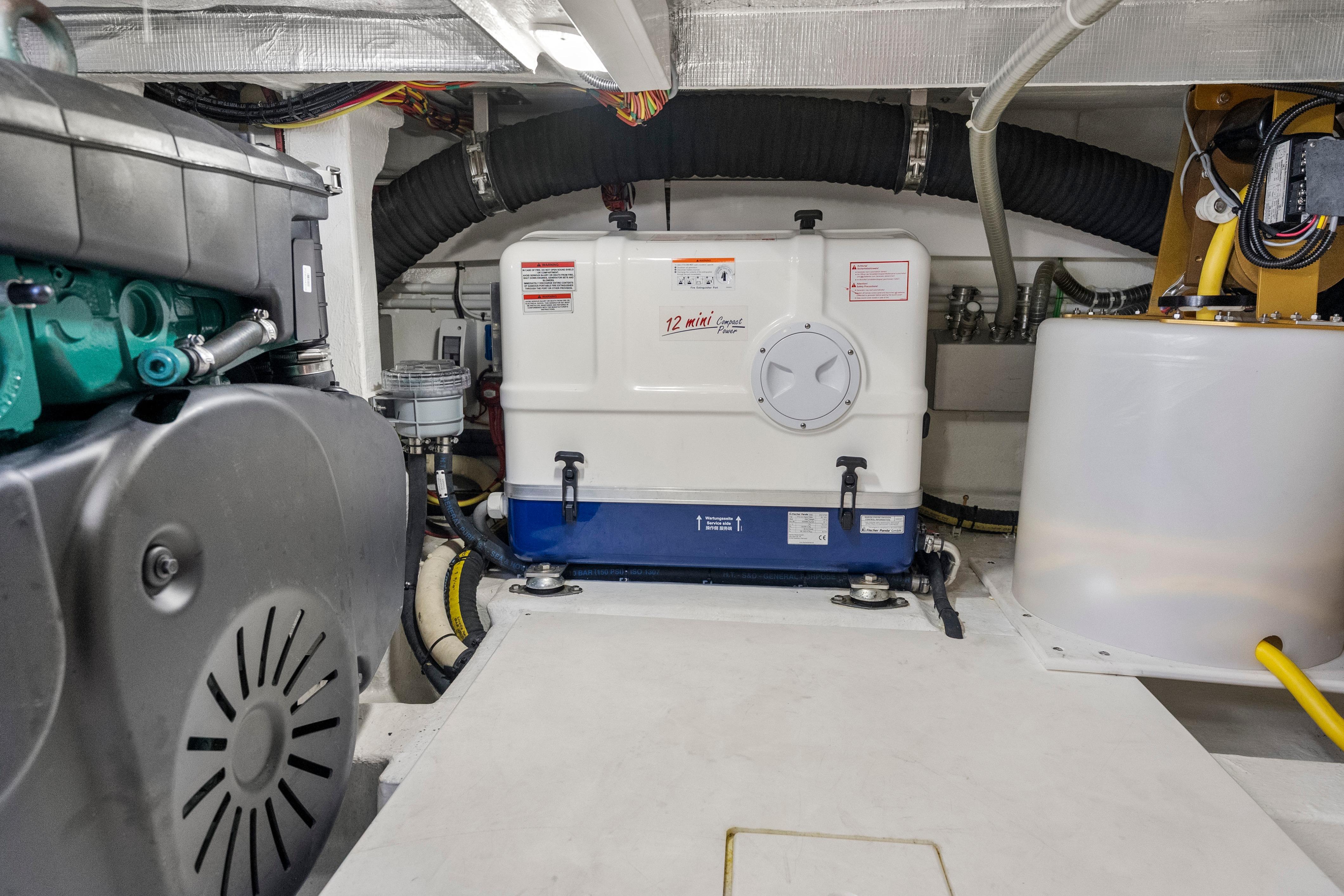 Engine room of 2023 Galeon 400 Fly yacht, featuring mechanical components and equipment.