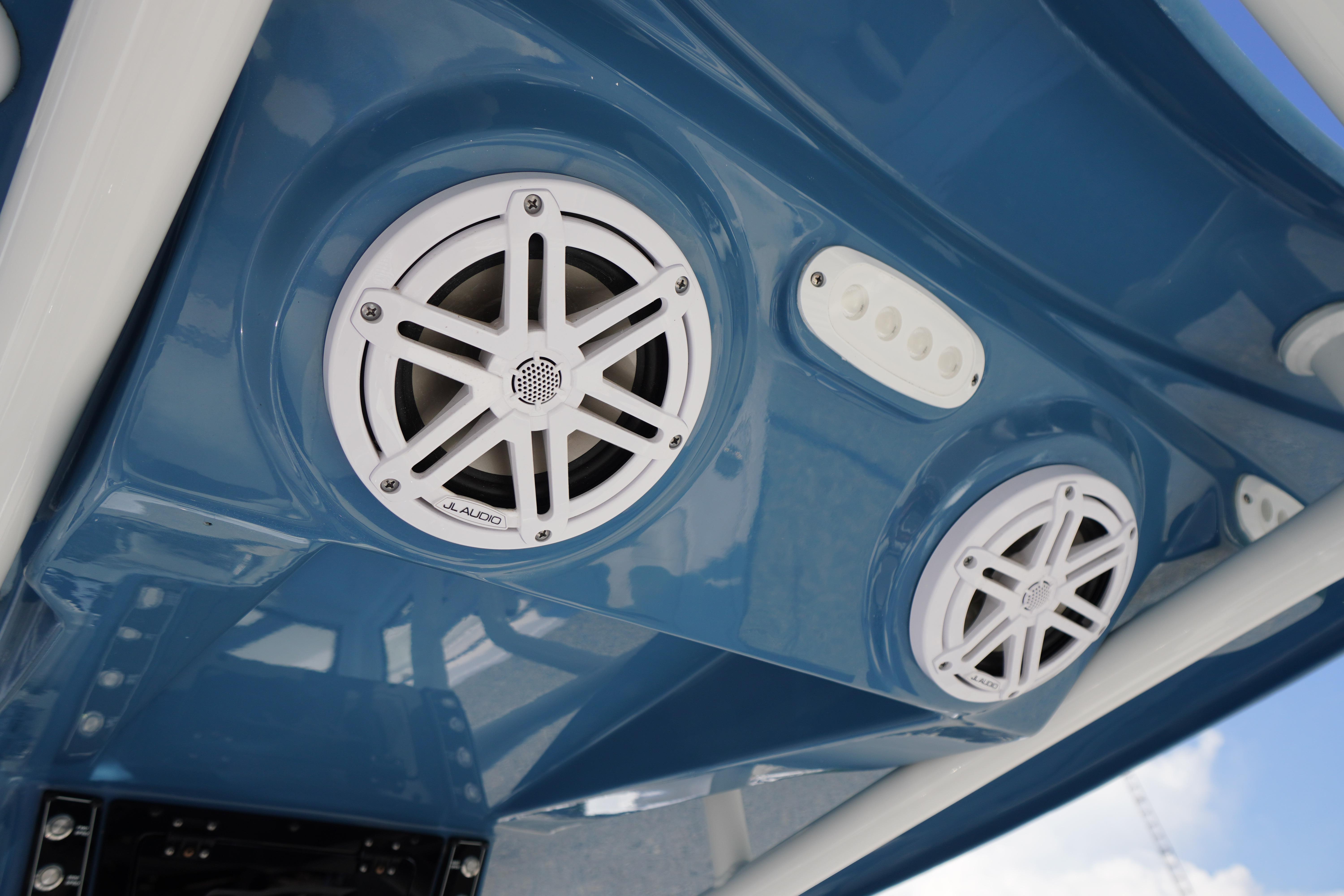 2025 Tidewater 232 SS boat speakers and controls on blue panel.