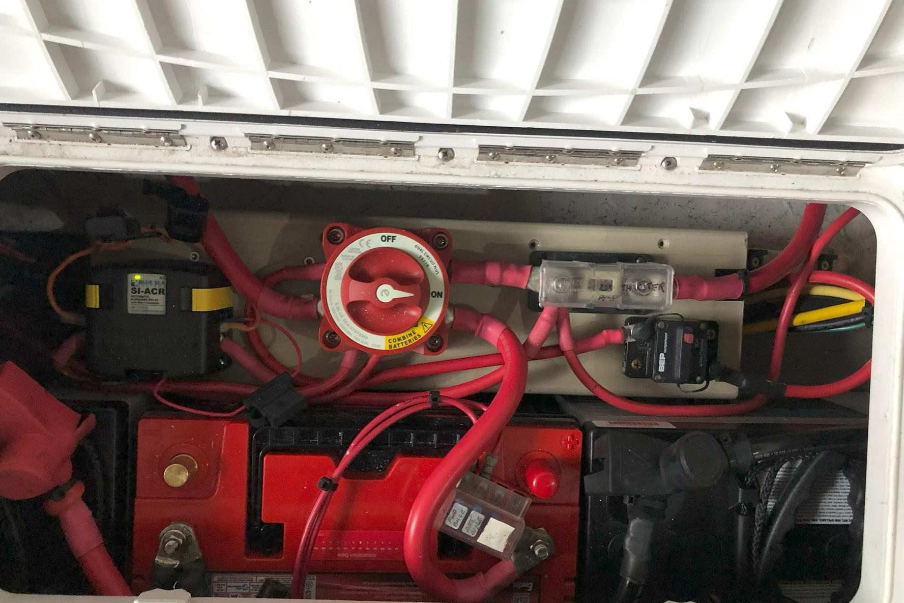 Electrical system of a 2017 Atlas Boat Works Acadia 25, featuring battery and wiring components.