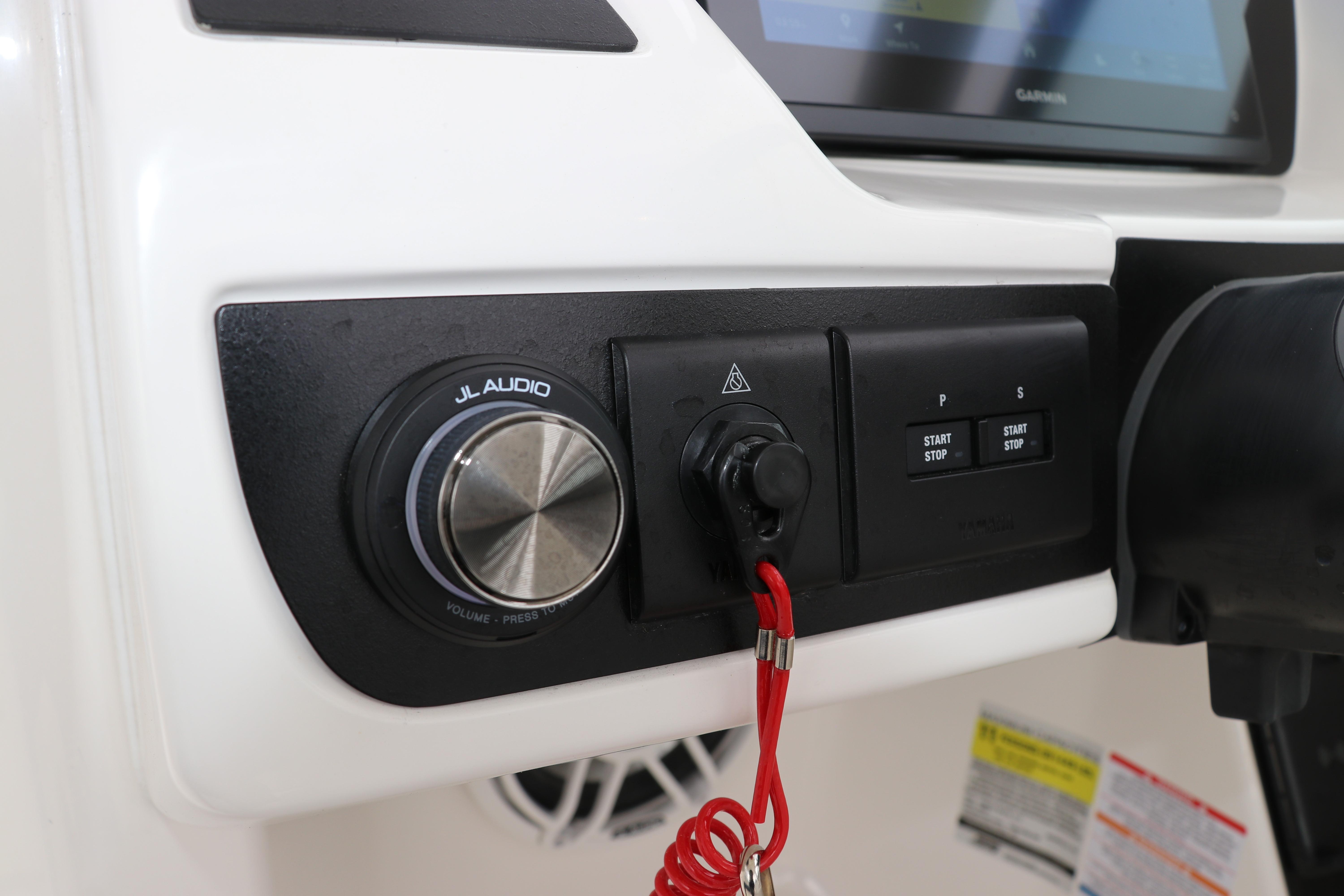 Control panel of 2026 Robalo R257 Dual Console with JL Audio system.