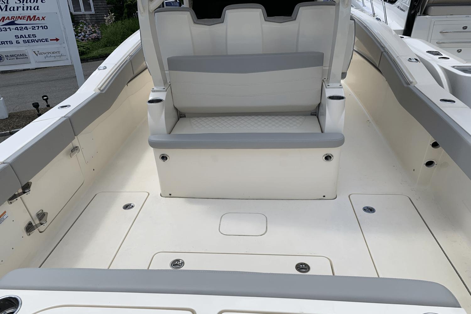 2024 Scout 357LXF boat interior with seating and storage compartments.