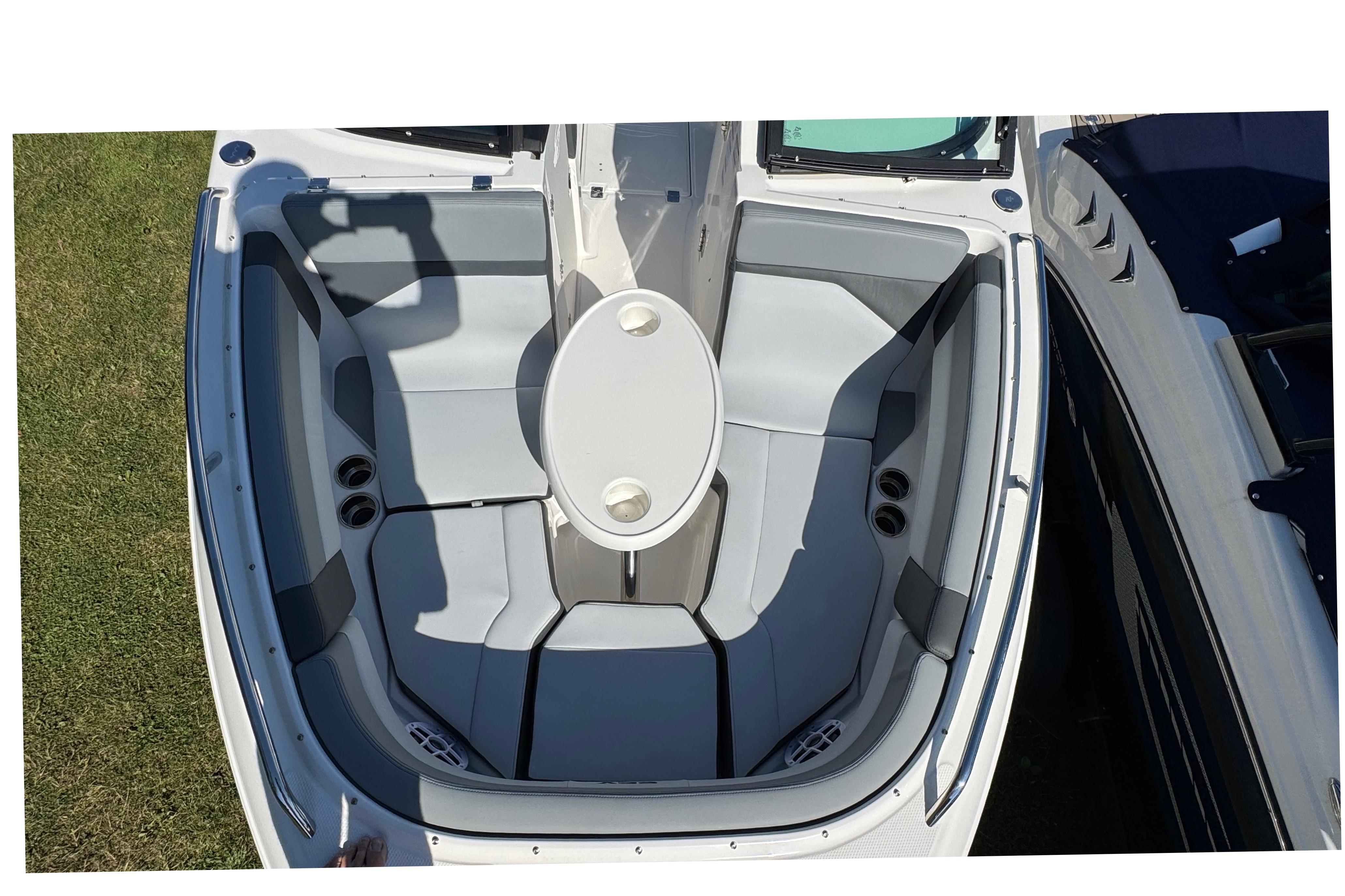 2026 Chaparral SSX 4 boat interior with sleek seating and central table.