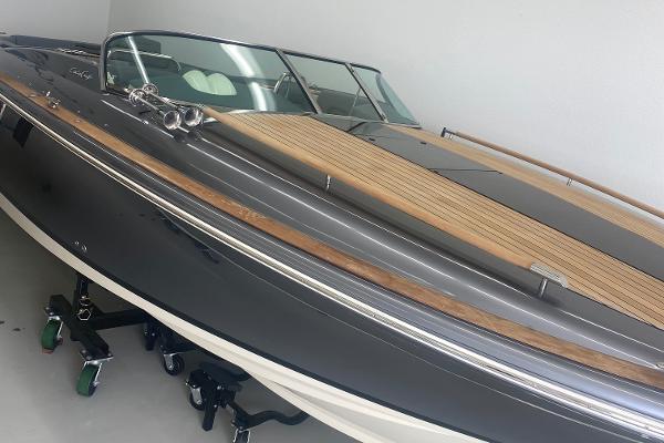 2021 Chris-Craft Corsair 34 boat displayed indoors.