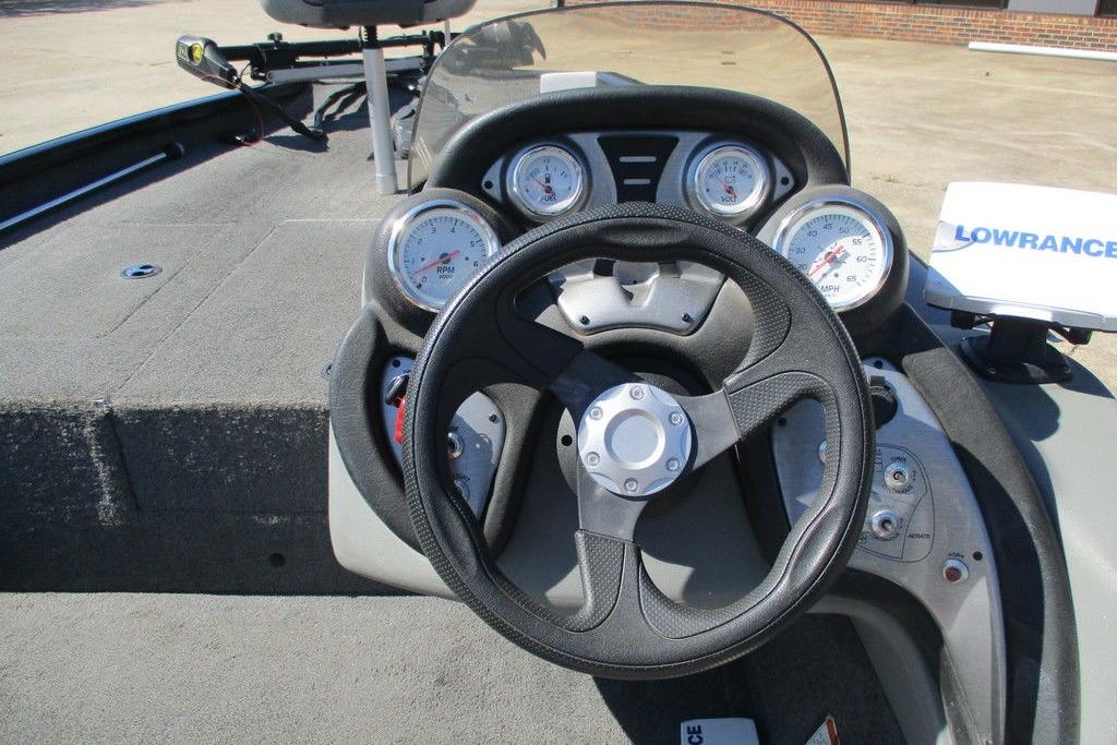 Steering console of 2017 Tracker Pro Team 175 TXW boat with gauges and Lowrance device.