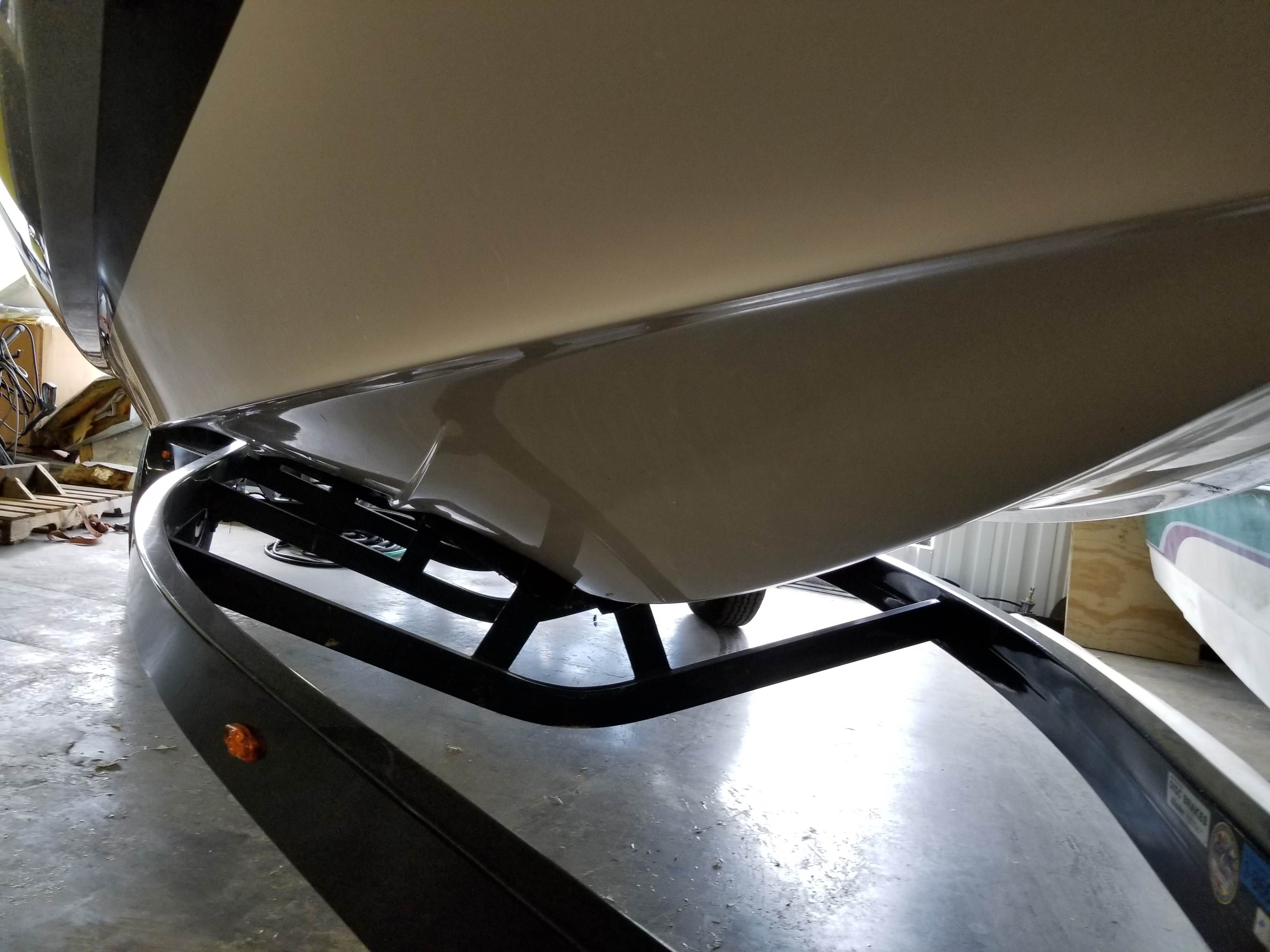 Close-up of a Moomba Mondo boat hull on a trailer.