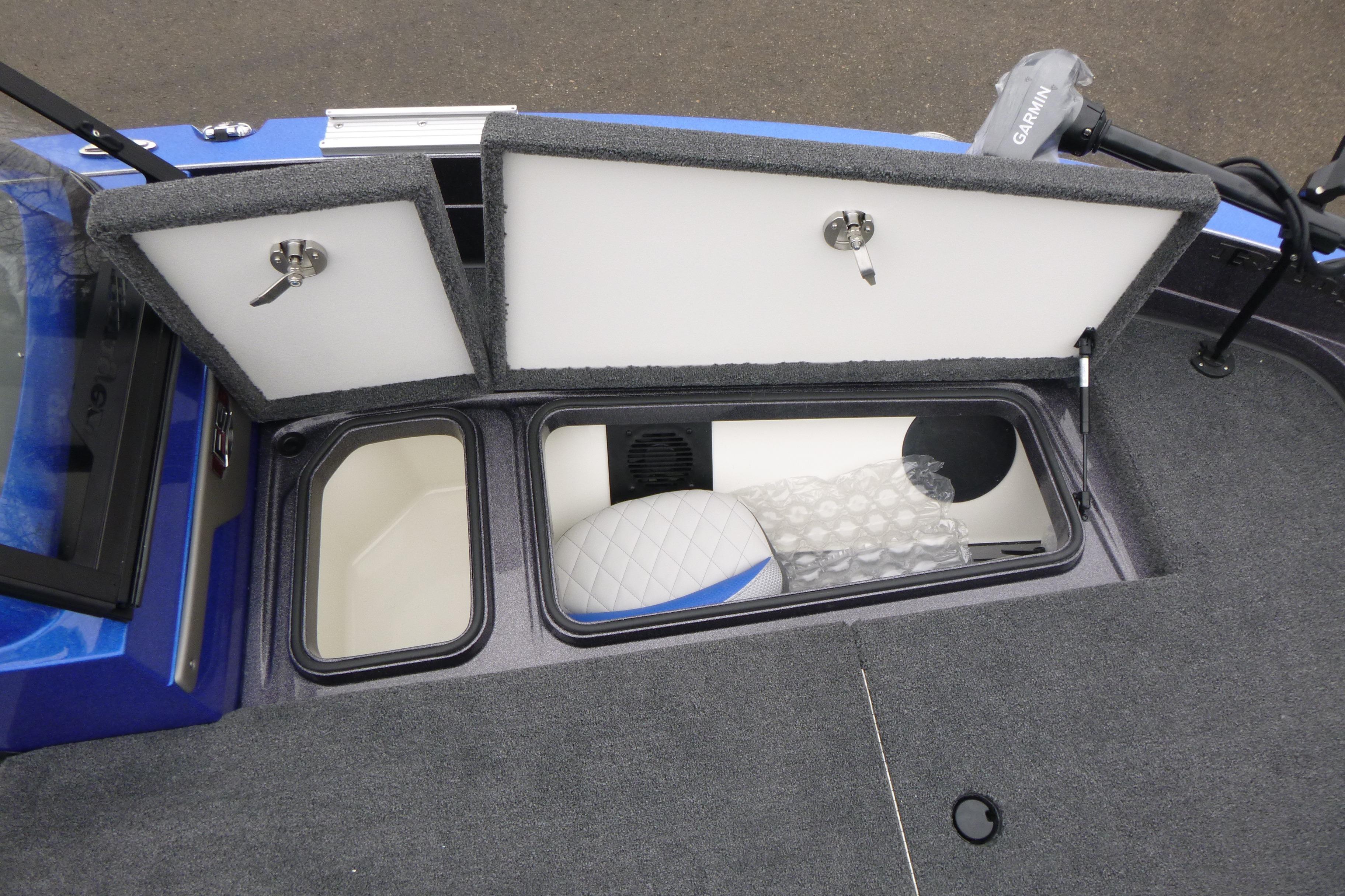 2026 Ranger 620FS Cup Equipped boat storage compartments open, showcasing interior features.