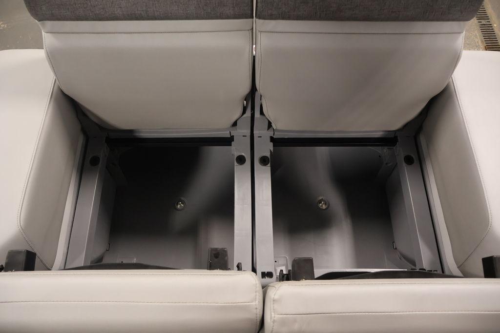 2023 Sea-Doo Switch Sport Compact storage compartment with open seats, showcasing interior space.