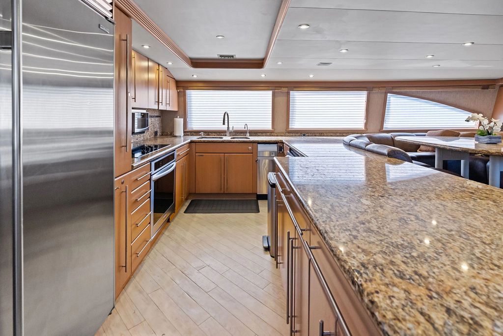 Luxurious kitchen on a 1999 Westport 112 yacht.