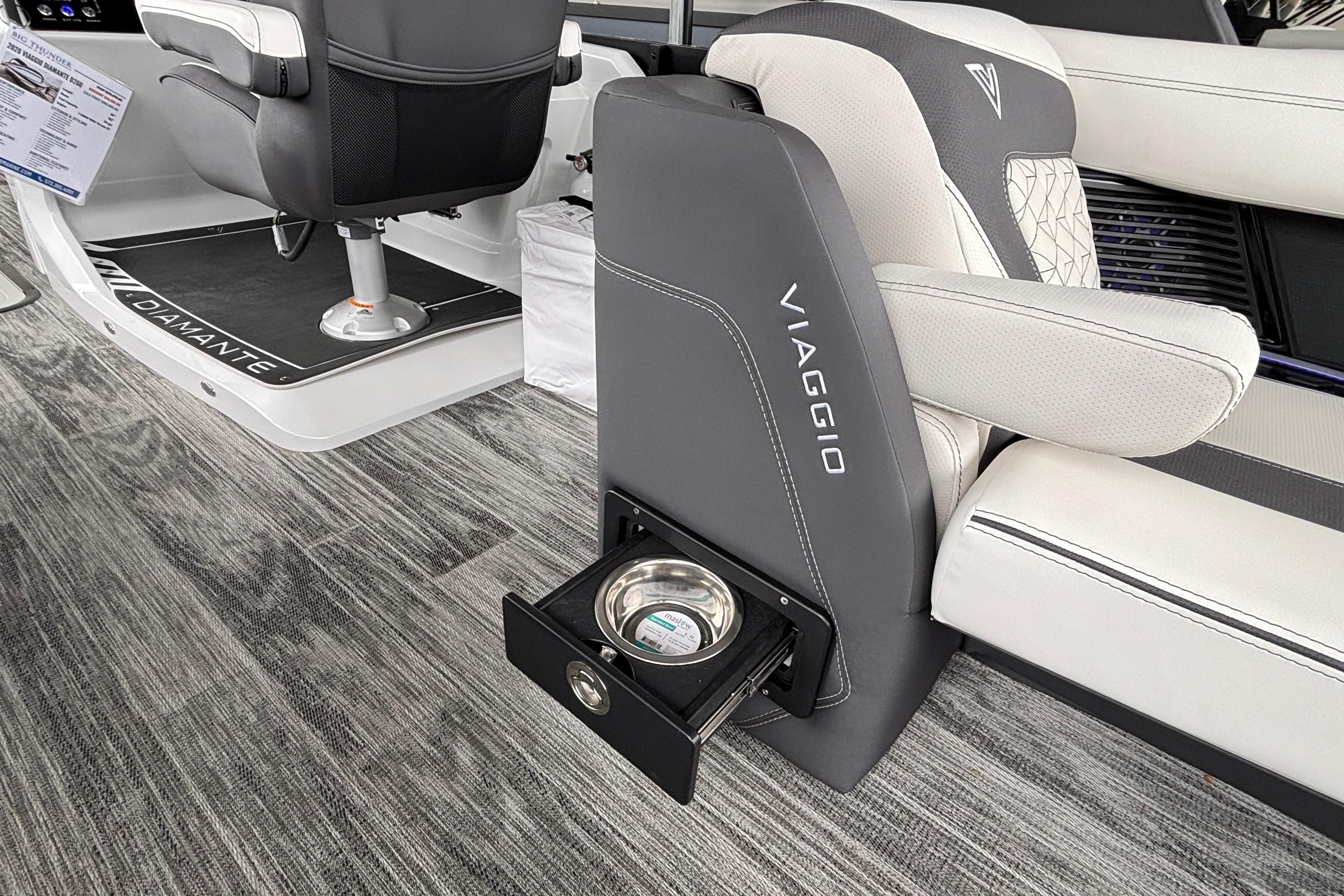 2026 Viaggio D26U boat interior with luxurious seating and integrated cup holder.