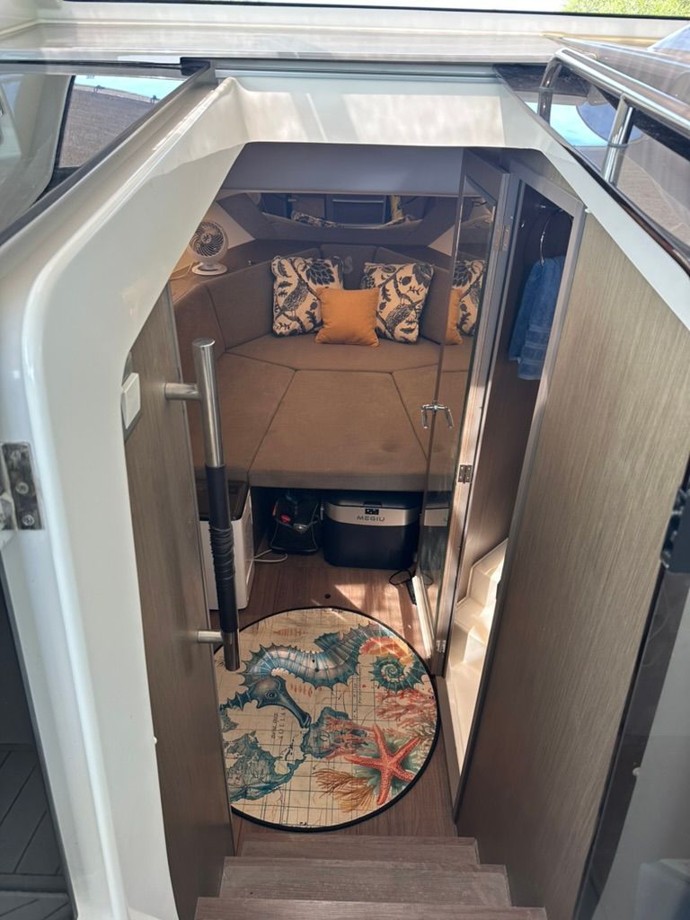 Interior of 2024 Beneteau Gran Turismo 32 with cozy cabin.