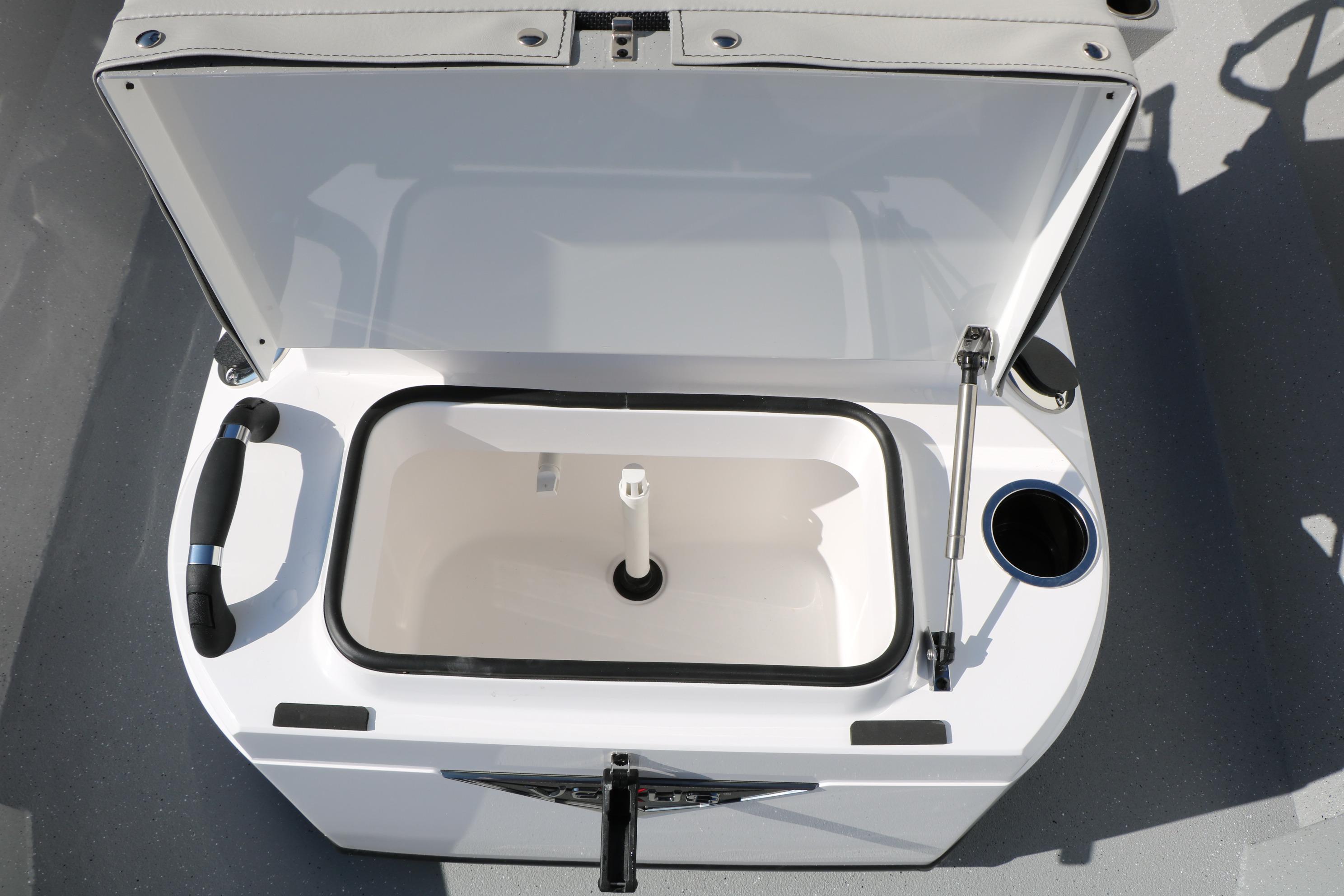Open storage compartment on Vexus ACX2000 boat, 2026 model, with handle and cup holder.