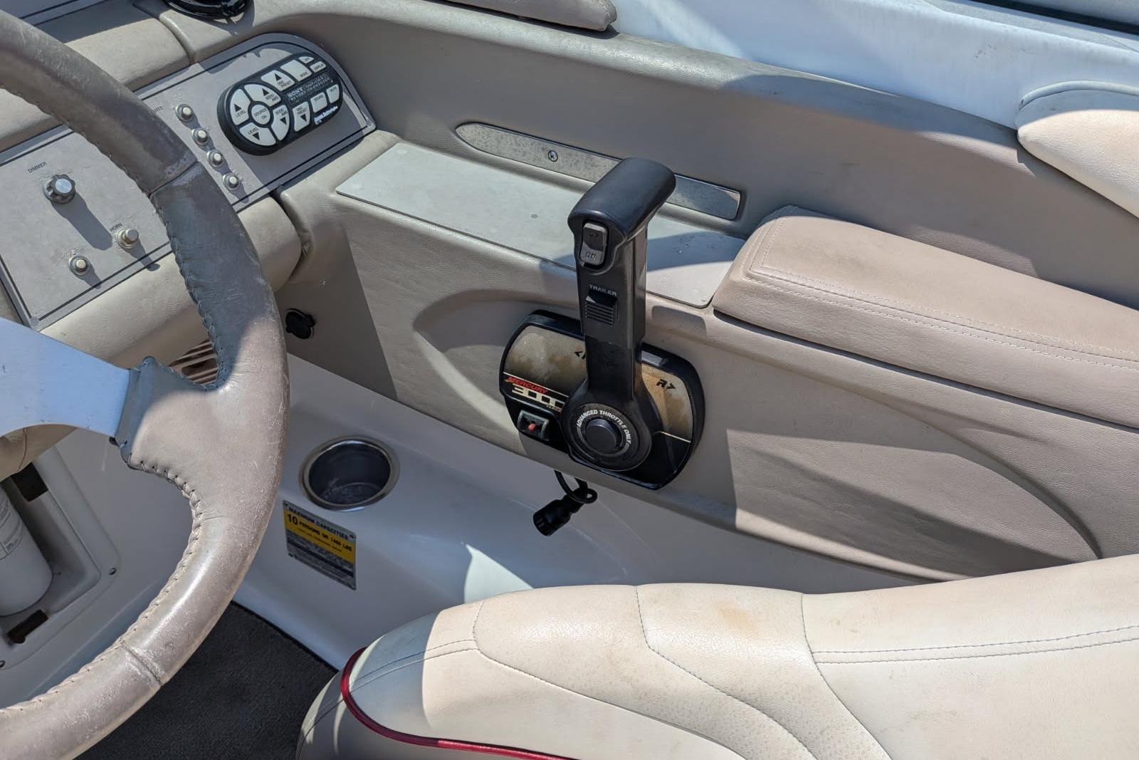 Interior of a 2020 Cobalt 206 boat showing steering wheel and control panel.