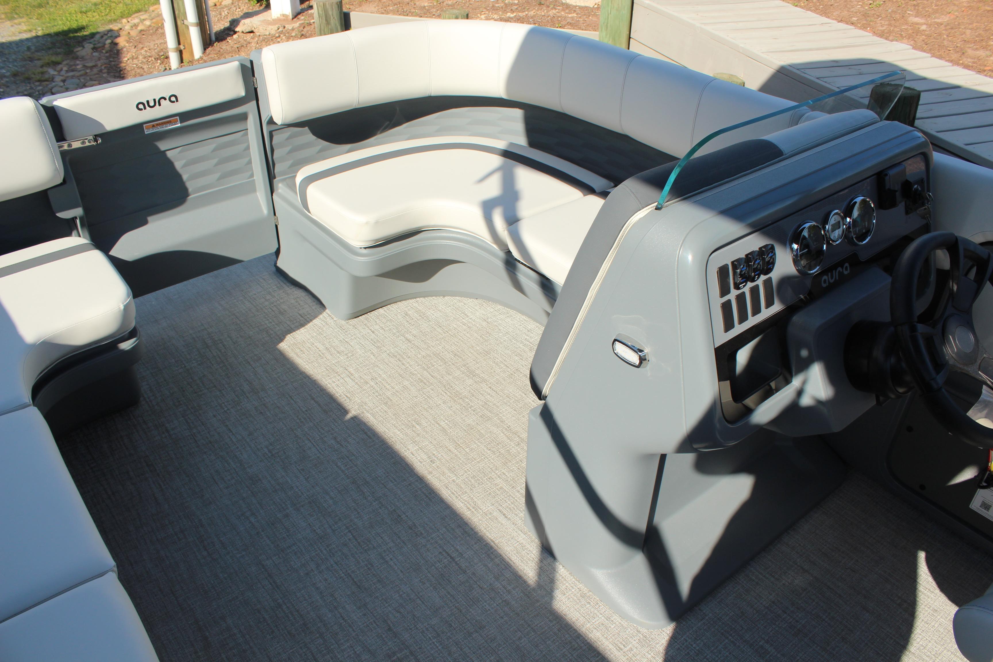 2026 Tahoe Pontoon Aura interior with modern seating and sleek dashboard design.