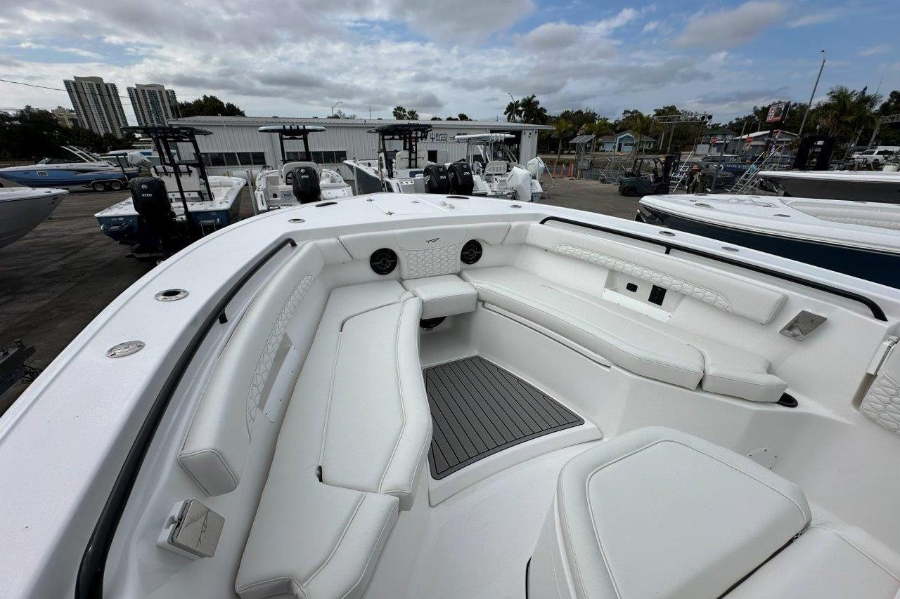 2026 Tidewater 272 LXF boat with spacious white seating and modern design.