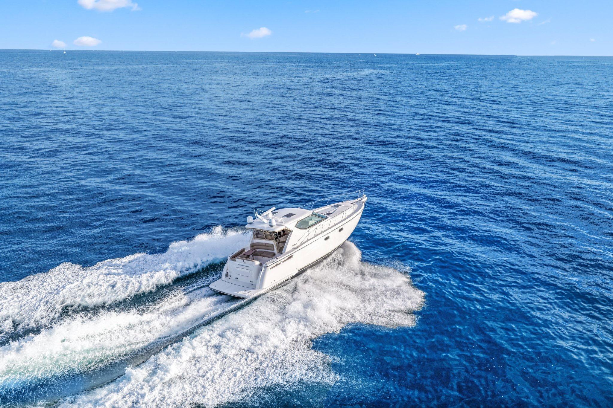 2008 Tiara Yachts 4300 Sovran cruising on open blue ocean waters.