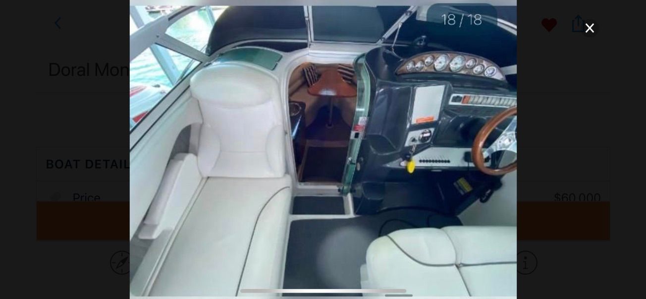 Interior of a 2007 Doral Monticello with white upholstery and a modern dashboard.