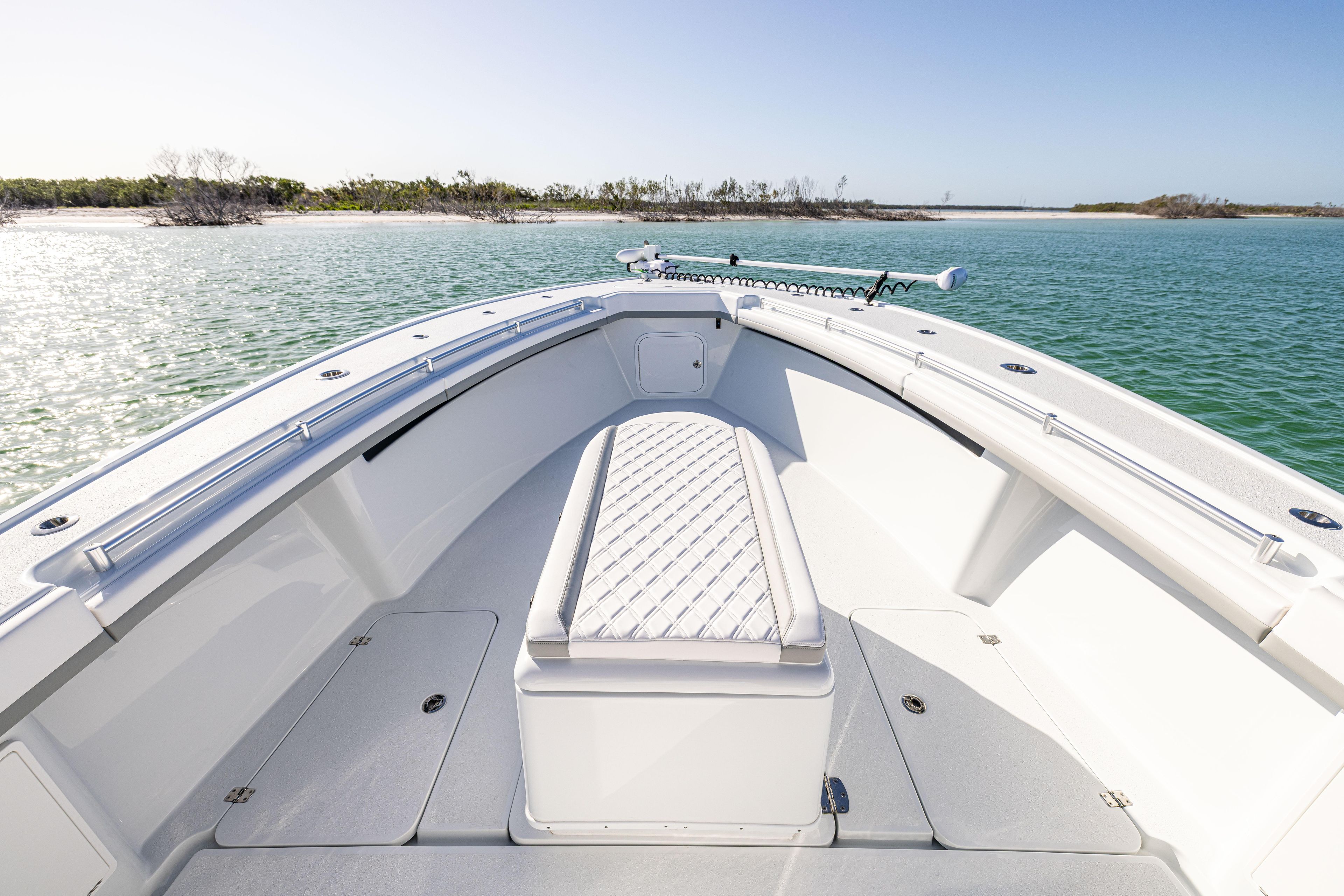 2023 Yellowfin 39 Offshore boat, spacious deck, calm waters, clear sky, scenic view.