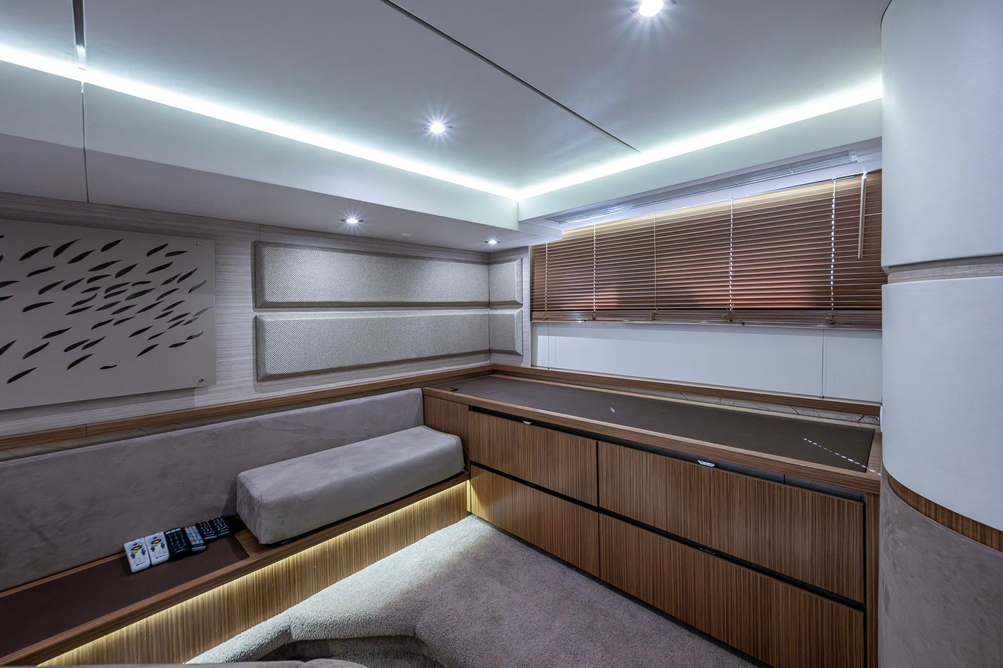 Luxurious interior of 2018 Sea Ray L550 Fly yacht with modern design and ambient lighting.
