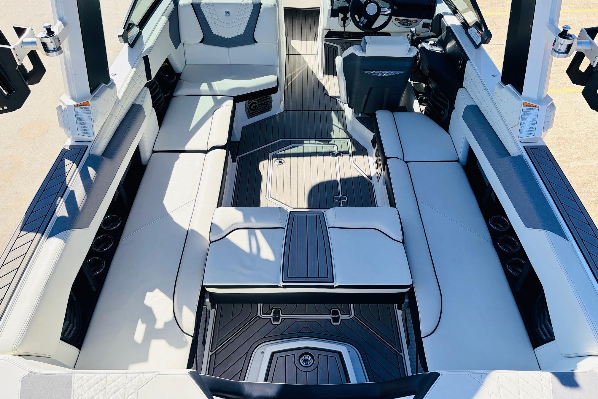 2023 Nautique Super Air Nautique G25 interior with luxurious seating and modern design.