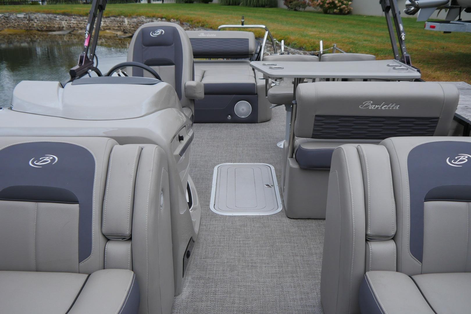 2023 Barletta CORSA 25UE pontoon boat interior with luxurious seating and modern design.