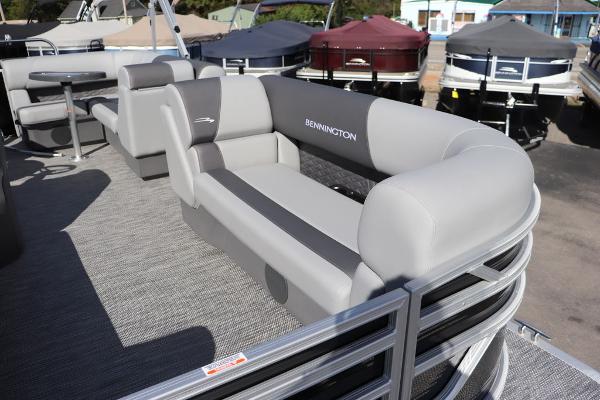 2024 Bennington 20 SL pontoon boat with gray seating and sleek design.