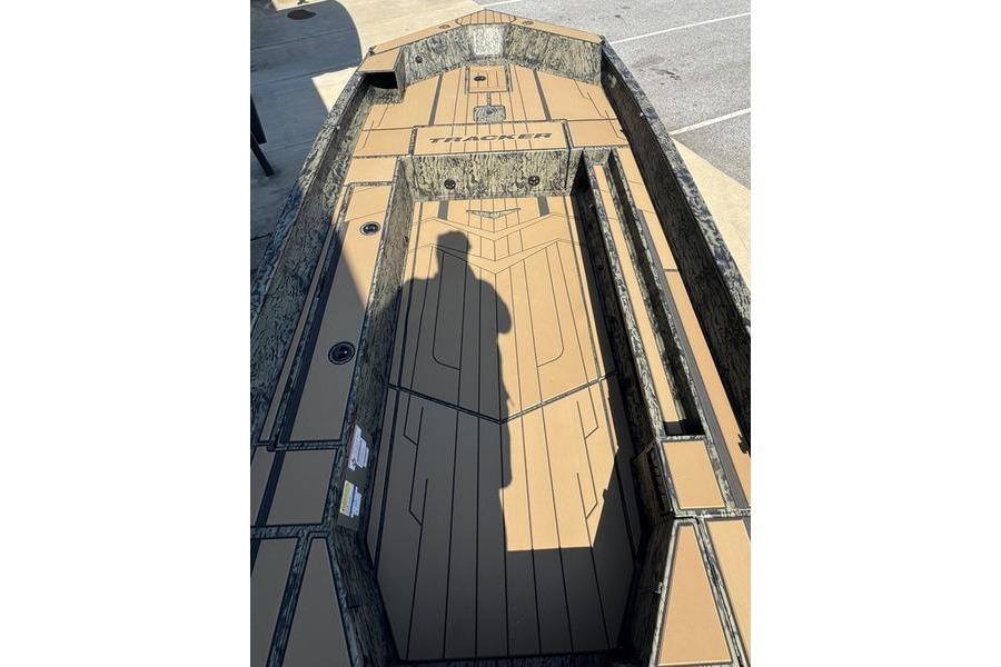 2026 Tracker Grizzly 1756 T Marsh boat interior with camouflage design and spacious deck.