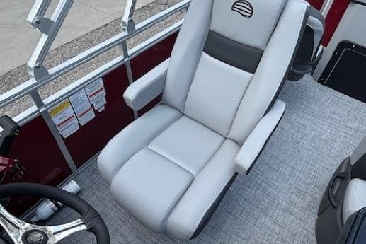 2026 Sun Tracker SportFish 20 DLX boat seat with steering wheel, gray upholstery.