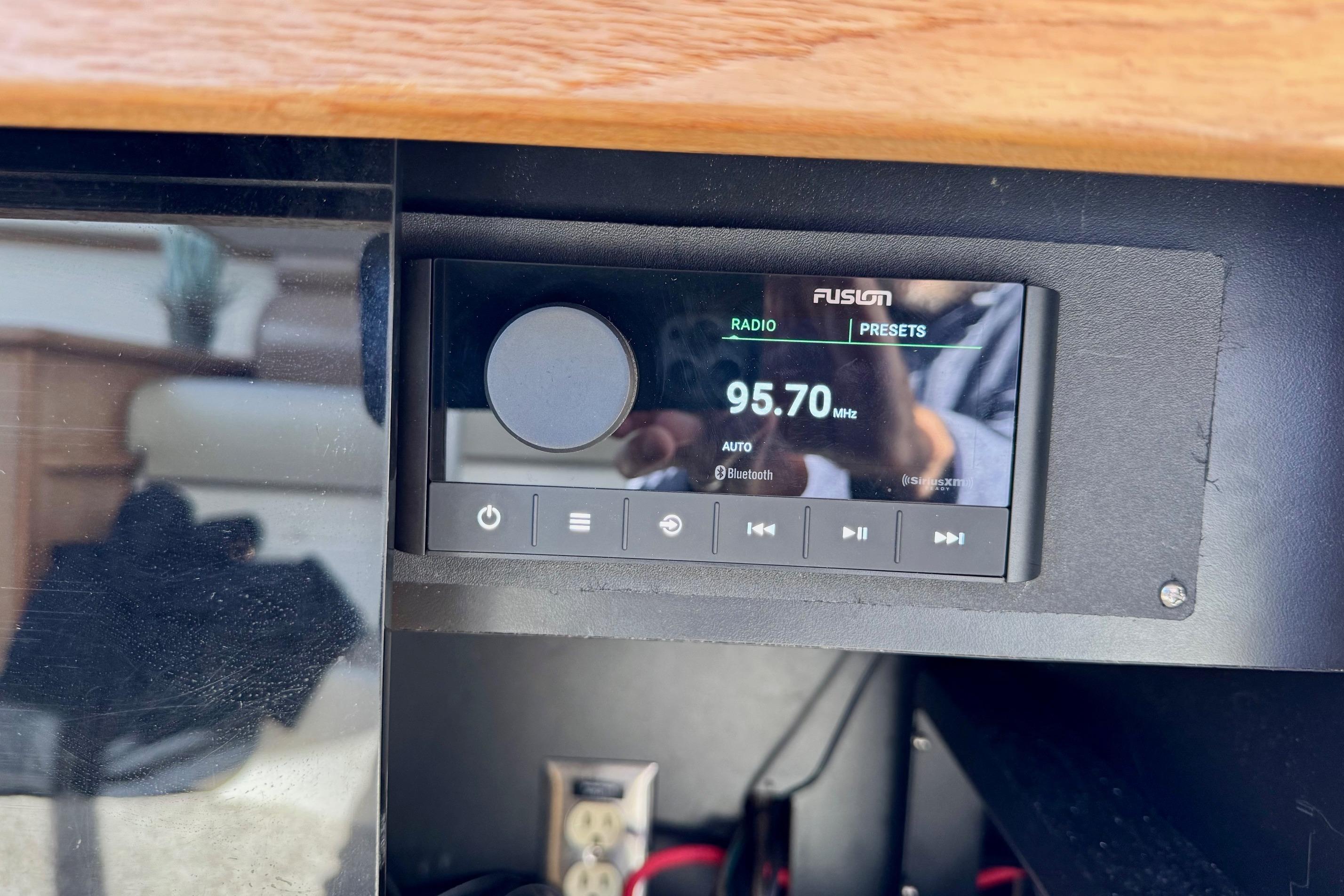 Radio display on 1998 Bayliner 3388 Command Bridge Motoryacht, tuned to 95.70 MHz.