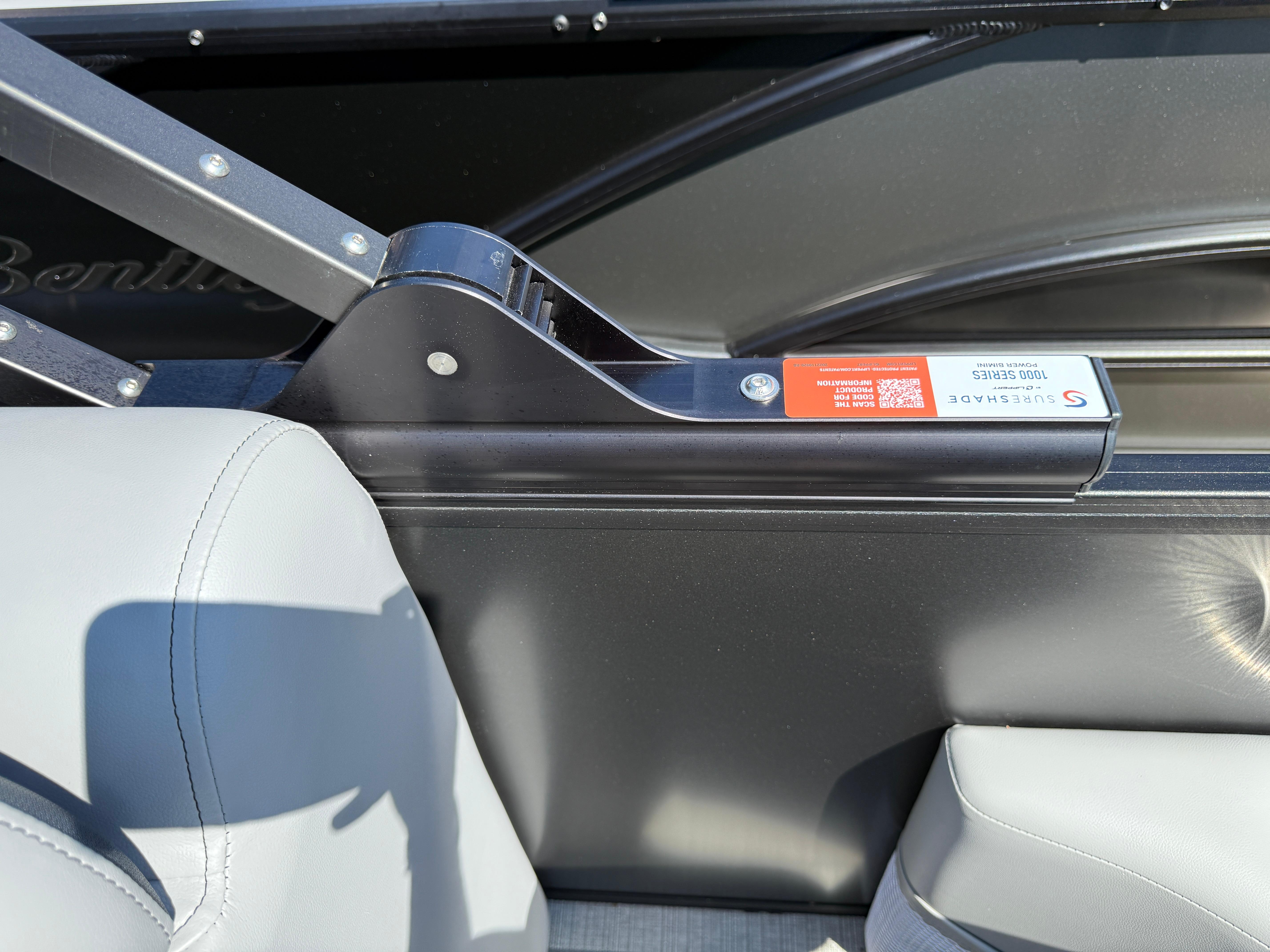 Interior detail of 2026 Bentley Pontoons Legacy 223 Navigator with SureShade mechanism.