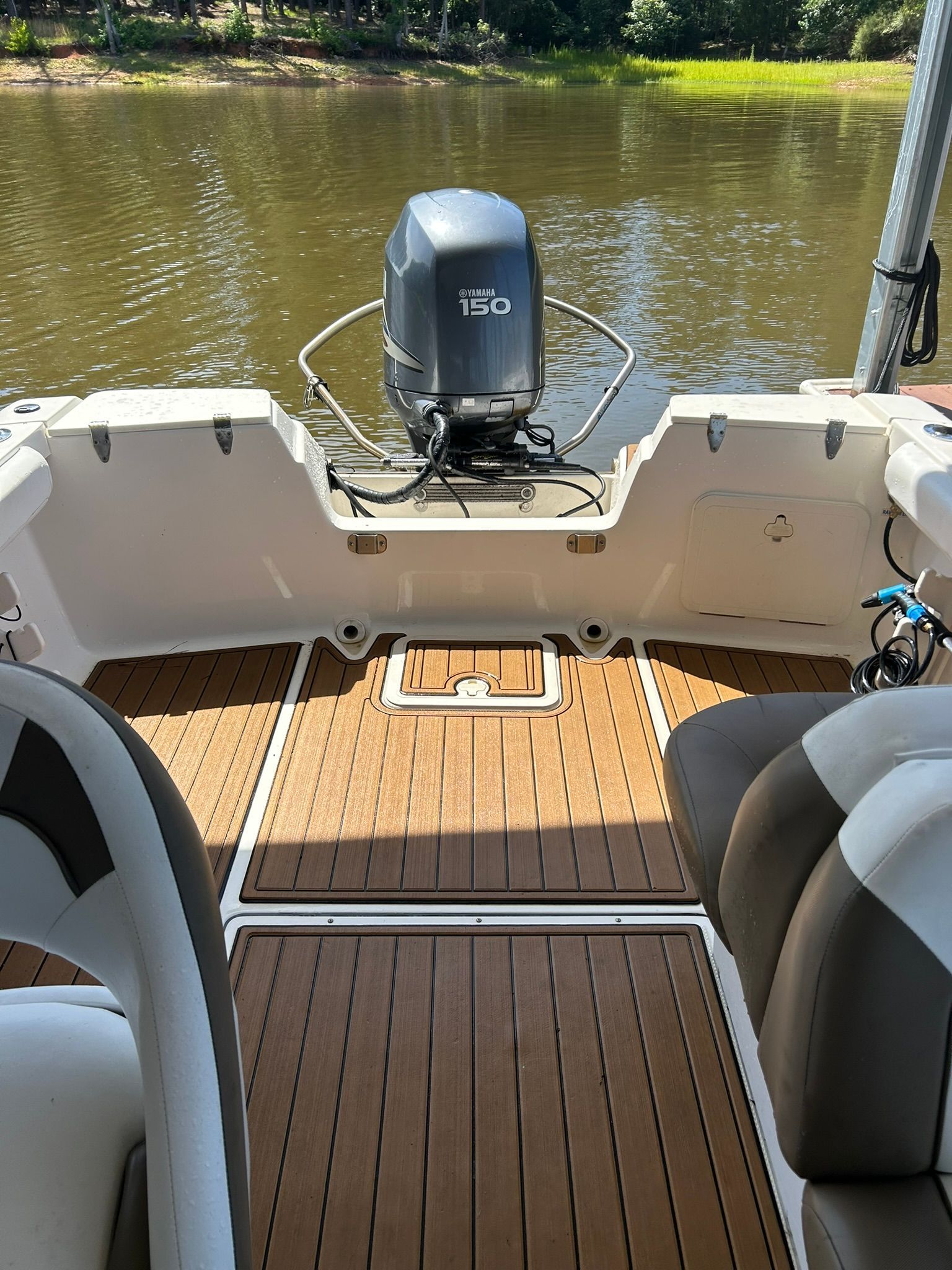 Key West 2020 Dual Console boat on calm water.