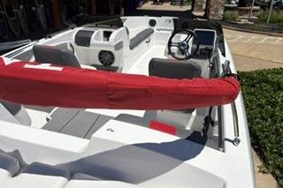 2026 Tahoe T16 boat interior with red safety rail and modern dashboard.