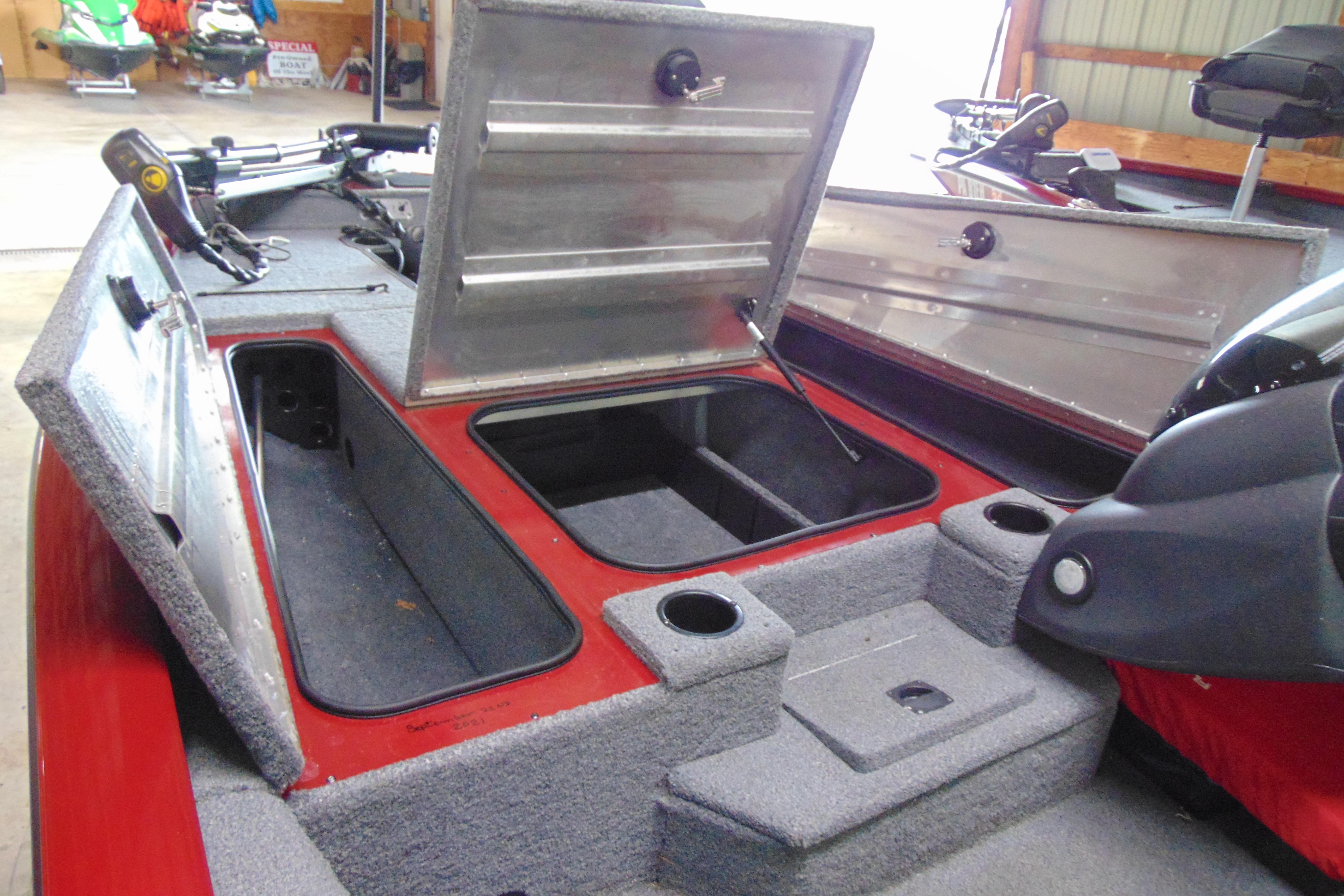 2022 Bass Tracker Pro 17 boat interior with open storage compartments.
