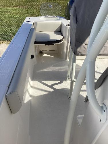 2022 Sailfish 220 CC boat interior with seating and railing.