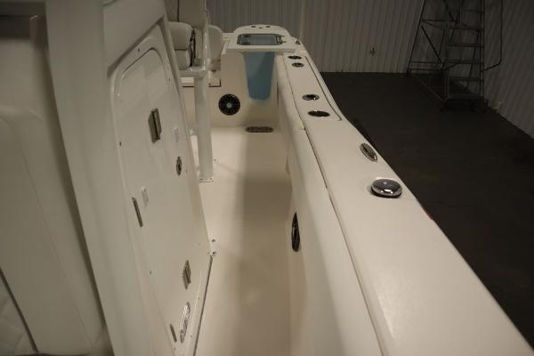 2025 Sea Fox 228 Commander boat interior with storage compartments and seating.