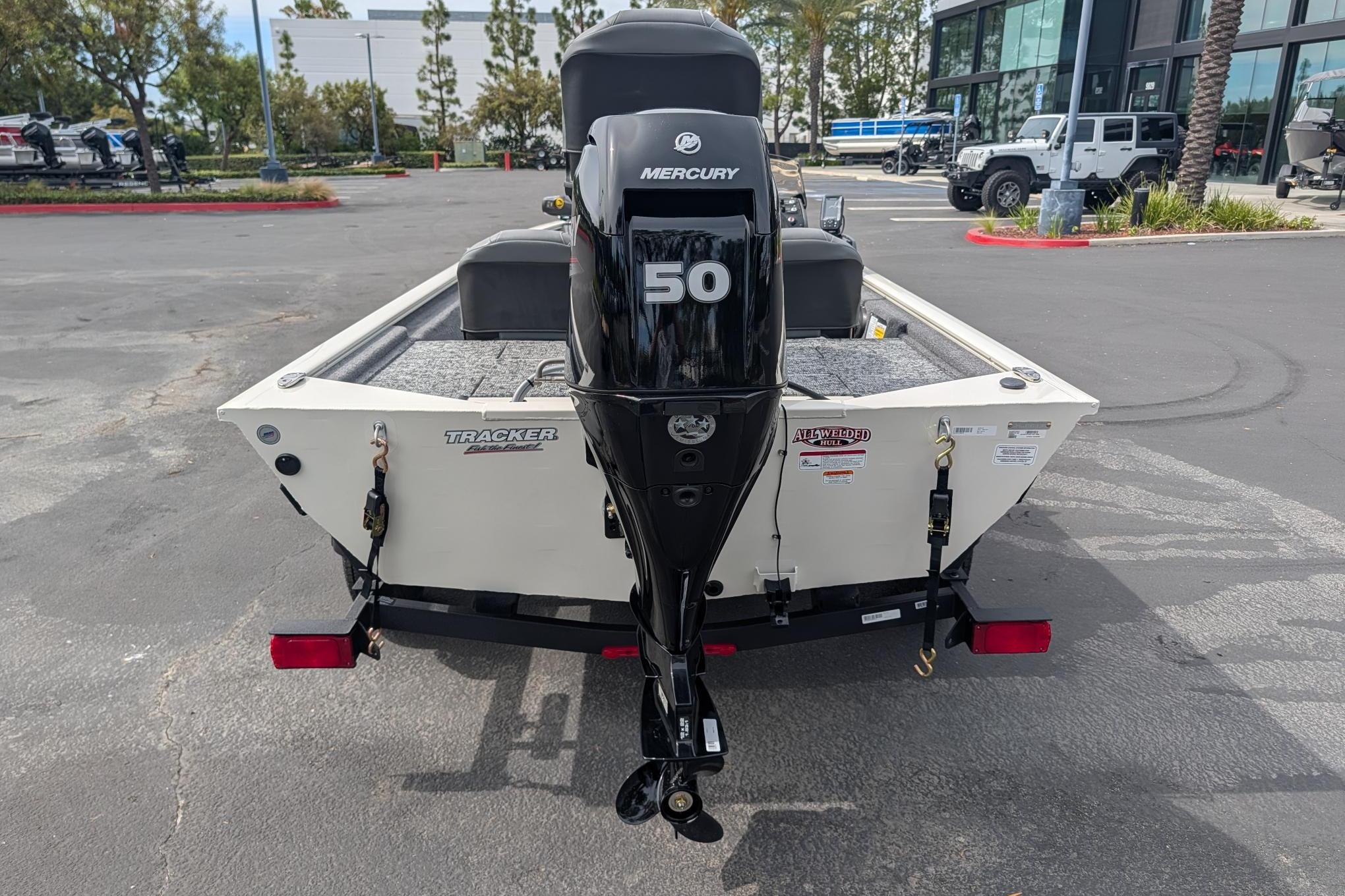 2026 Tracker Pro 170 boat with Mercury 50 engine, parked outdoors.