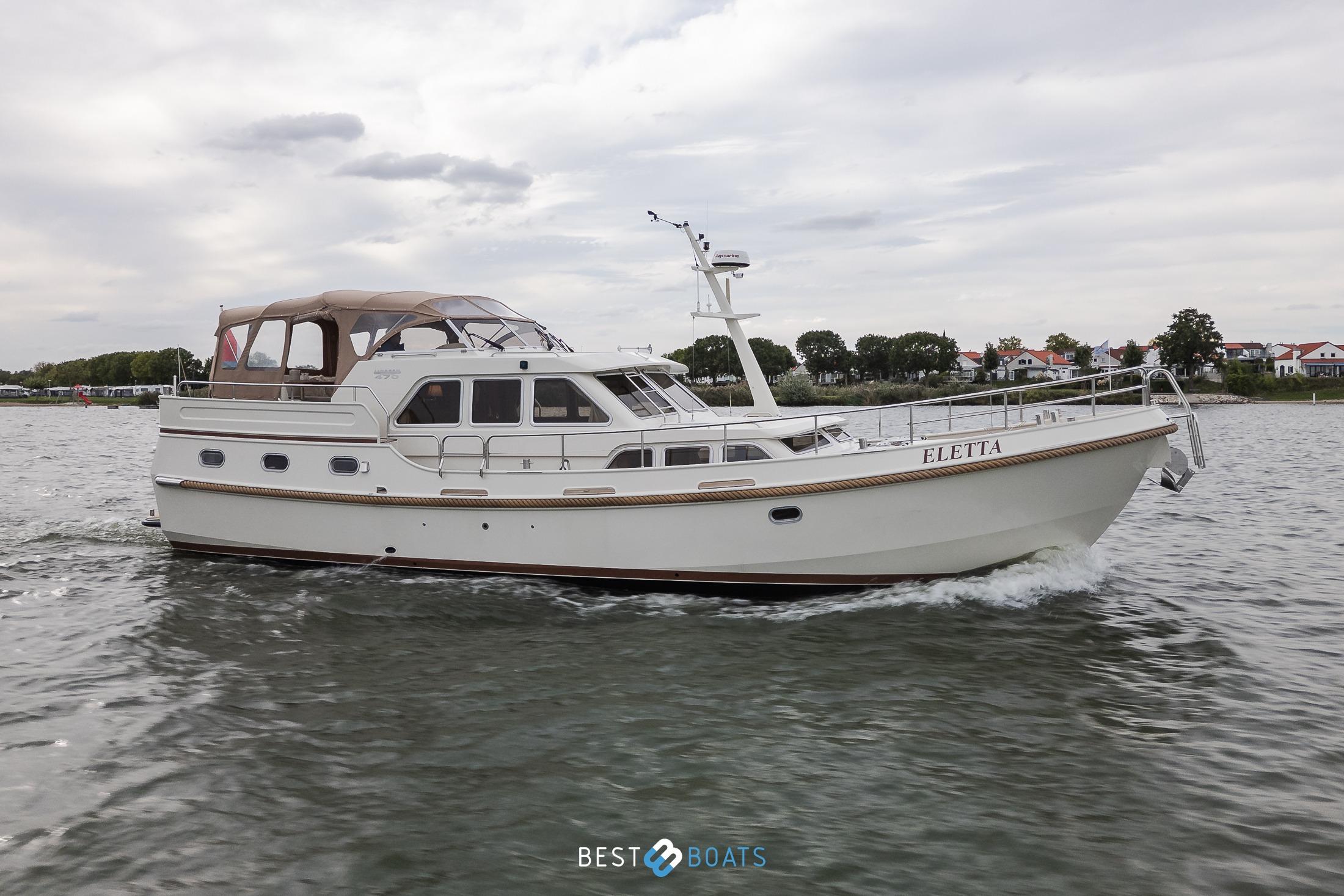 2010 Linssen Grand Sturdy 470 AC Mark II Twin yacht cruising on a calm waterway.