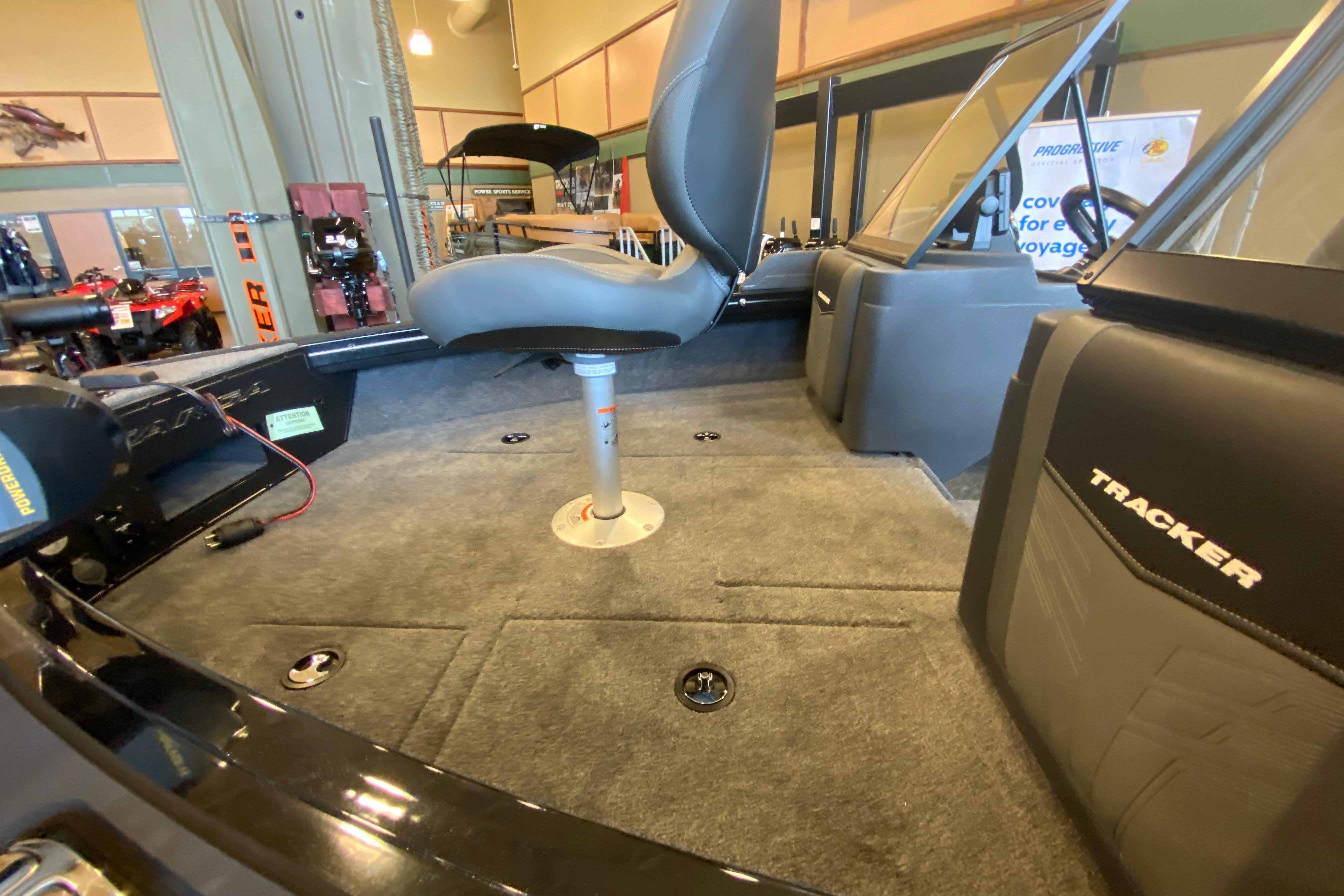 2026 Tracker Targa V-19 WT boat interior with seating and carpeted deck.