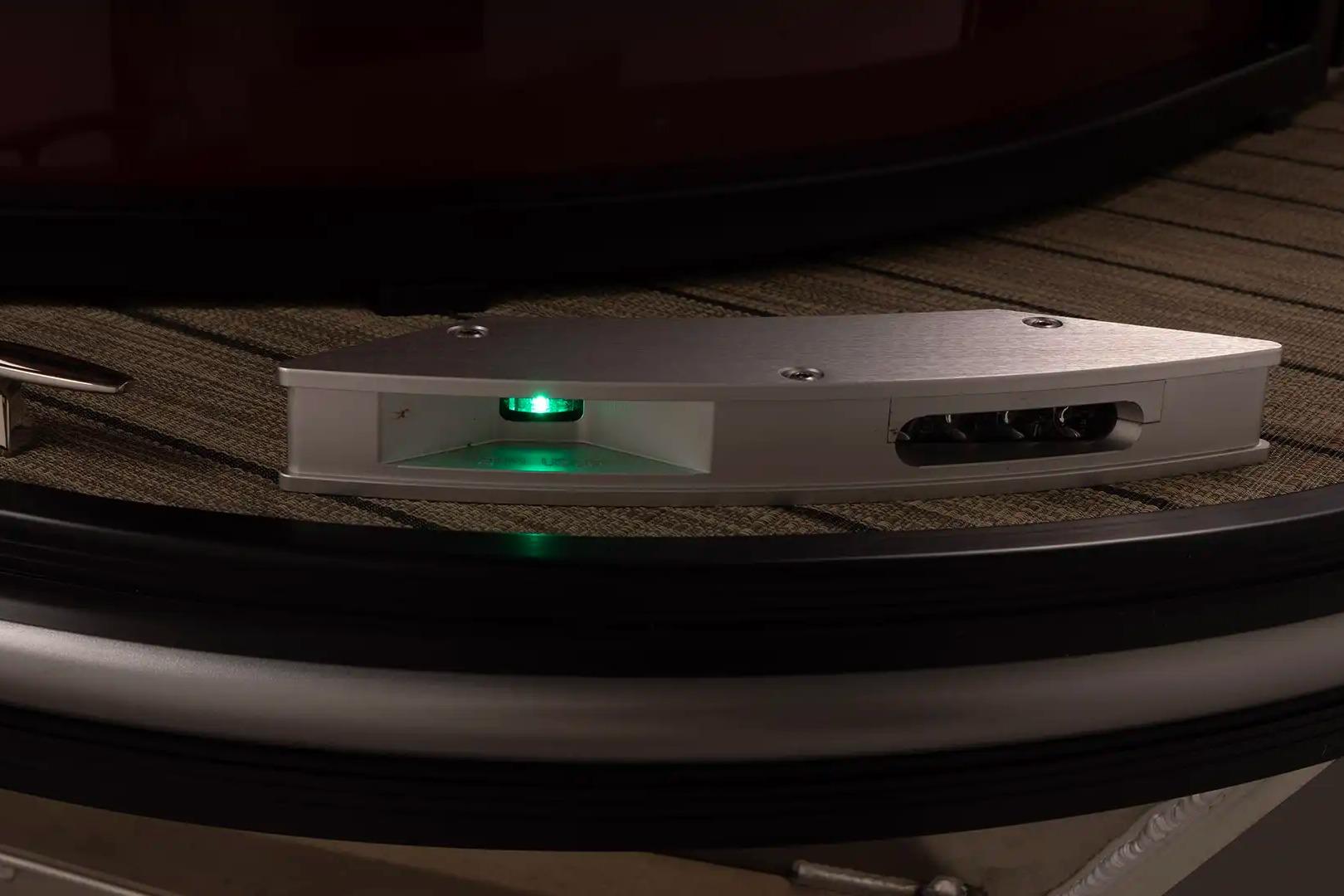 2026 SunCatcher Fusion 322SS boat detail with illuminated green light on deck.