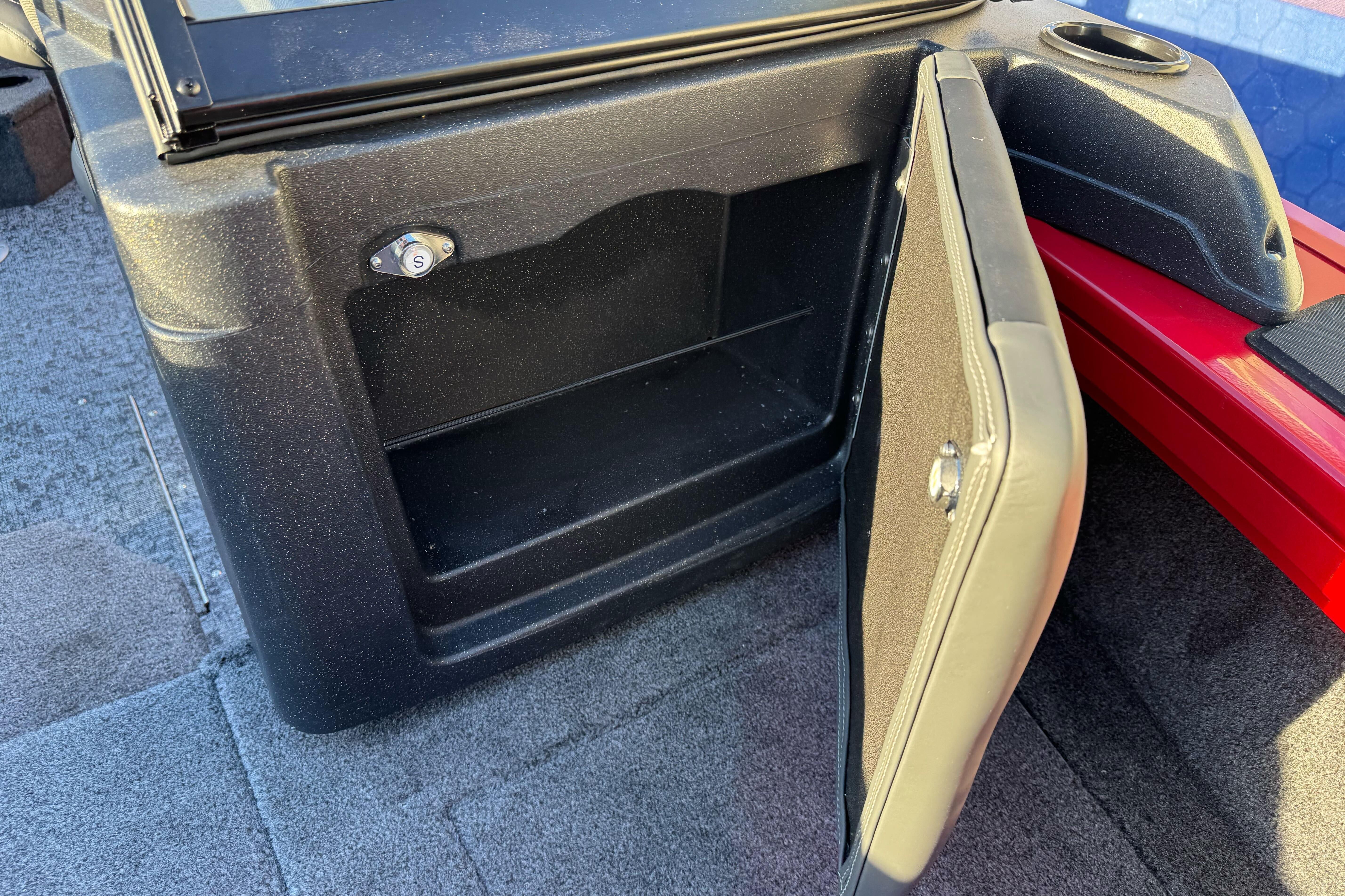 Open storage compartment in 2026 Tracker Targa V-18 WT boat interior.