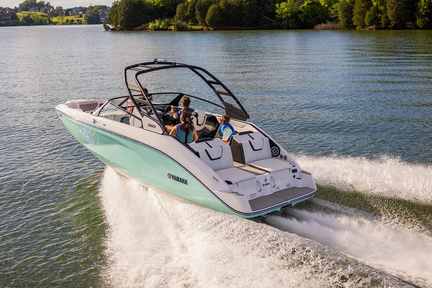 Manufacturer Provided Image: 2026 Yamaha Boats 222S cruising on a scenic lake with passengers enjoying the ride.