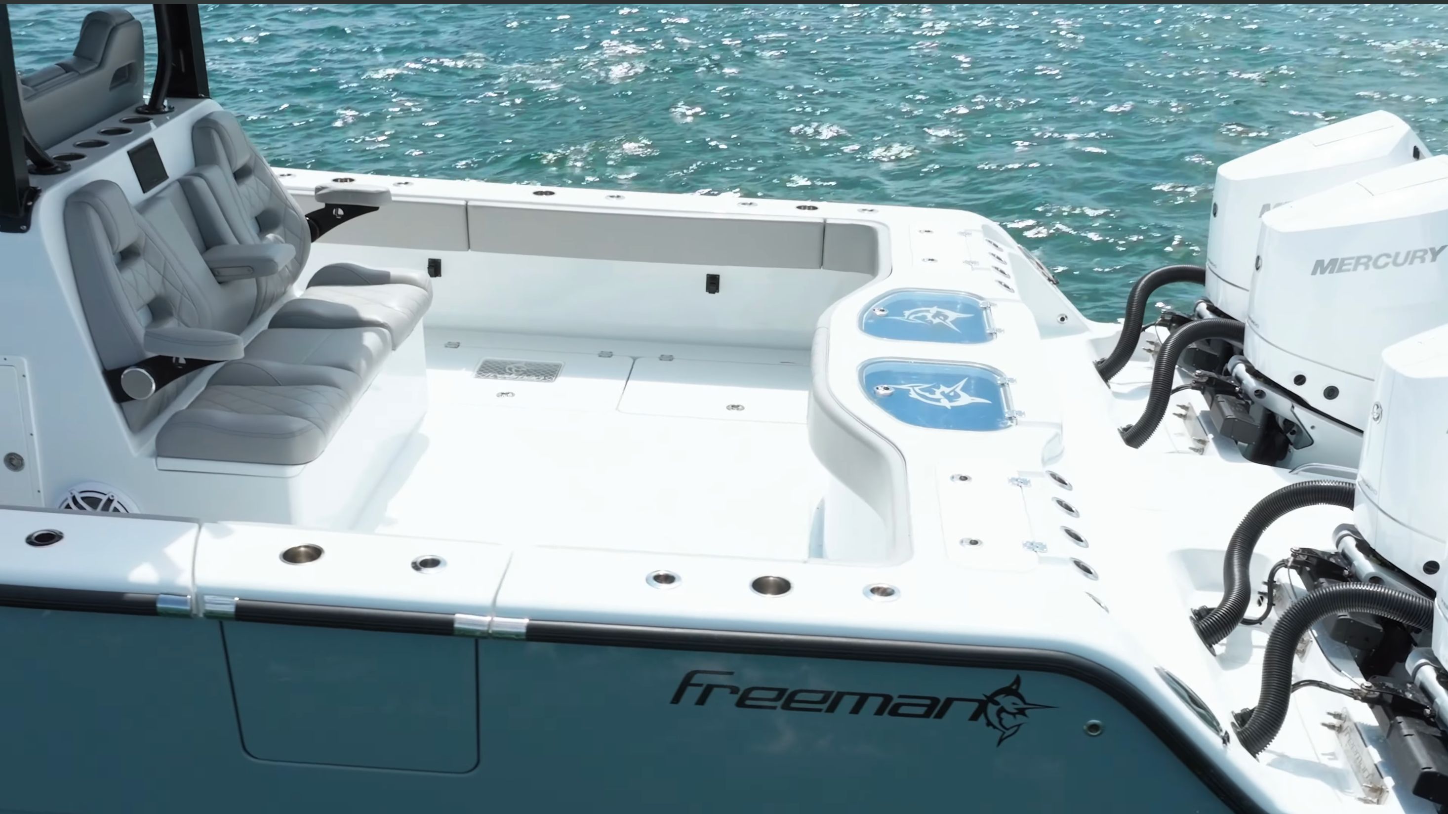 Freeman 43 boat 2024 on open water with luxurious seating.